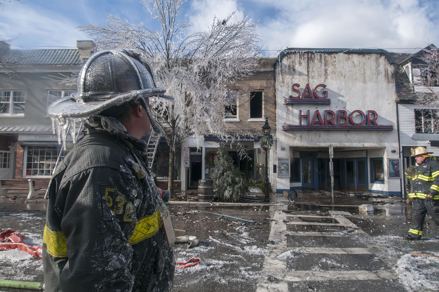 On December 16, 2016 at 6:11 a.m., the Sag Harbor Fire Department was called to 78 Main Street for a report of a deck fire at the rear of the building. Arriving units found a working fire that had begun to extend into the Sag Harbor Cinema and adjacent buildings, and immediately called for mutual aid from neighboring fire departments. Fueled by icy conditions and strong winds, the fire ended up requiring the help of 16 fire departments and 3 EMS agencies from across the east end of Long Island, as well as resources from Suffolk County Fire and Rescue services. Fortunately there were no injuries.   MICHAEL HELLER