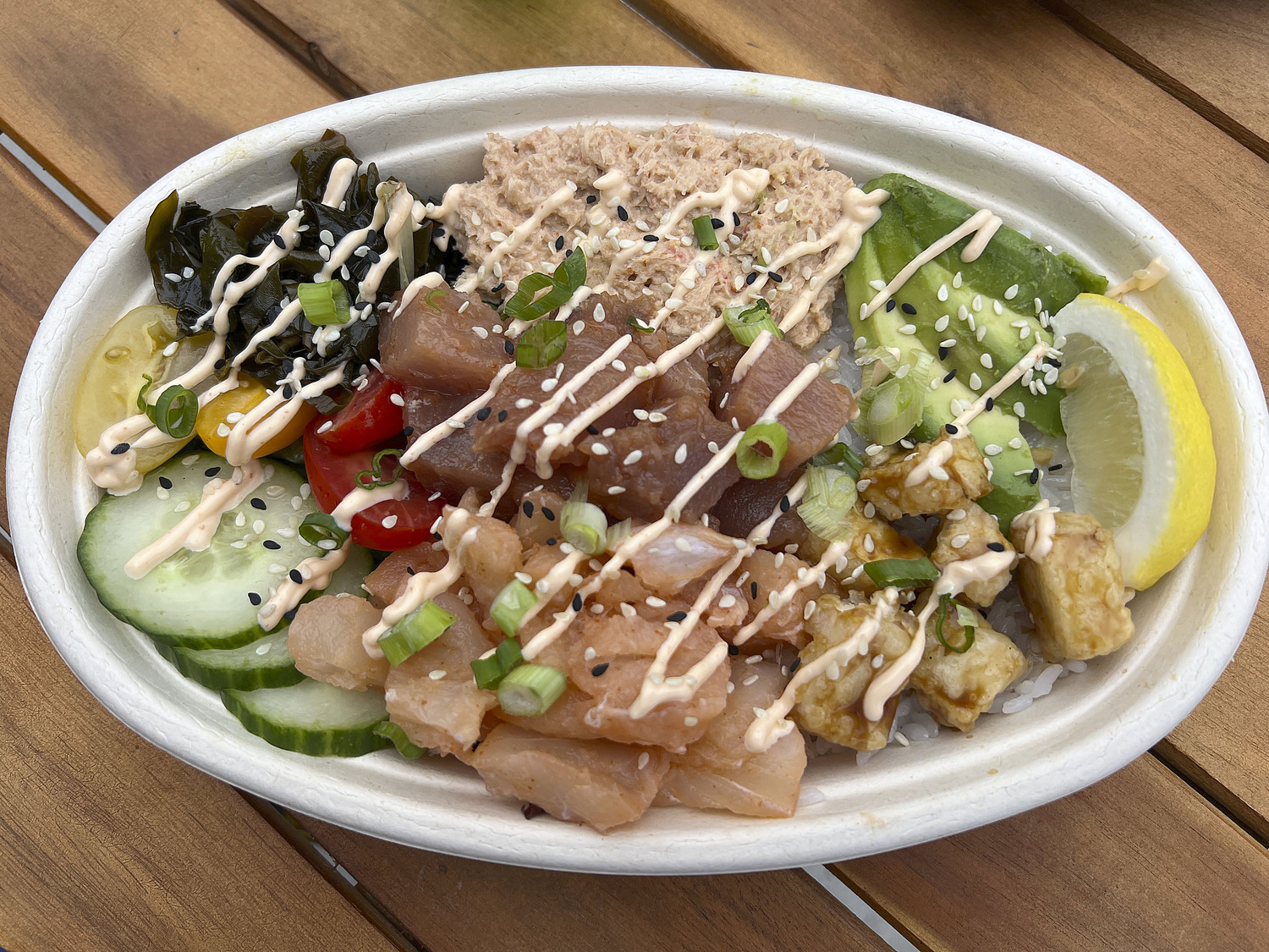 Haskell’s classic prepared seafood is still on offer, but the market now features a poke bowl station, where customers can build their own creation by picking a protein — local yellow fish, tuna, fluke, or red shrimp — and adding homemade toppings, including a ginger and soy-forward seaweed salad from Violet Cove Oyster Co. in Moriches Bay or a spicy Atlantic red crab salad on top of either greens, grains or rice.  DANA SHAW