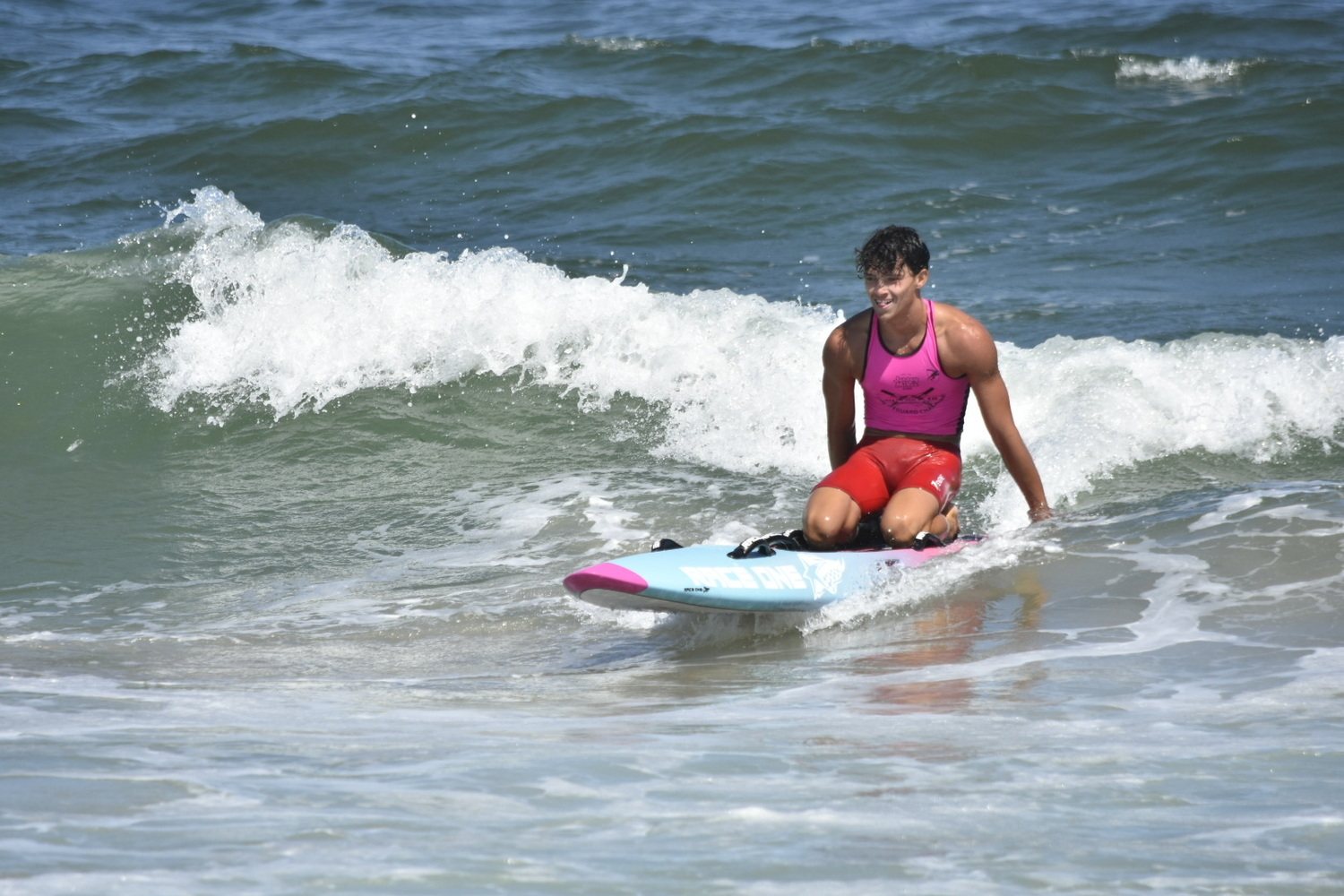 Liam Knight rides a wave to shore in the board rescue race.   COURTESY SEAN KNIGHT