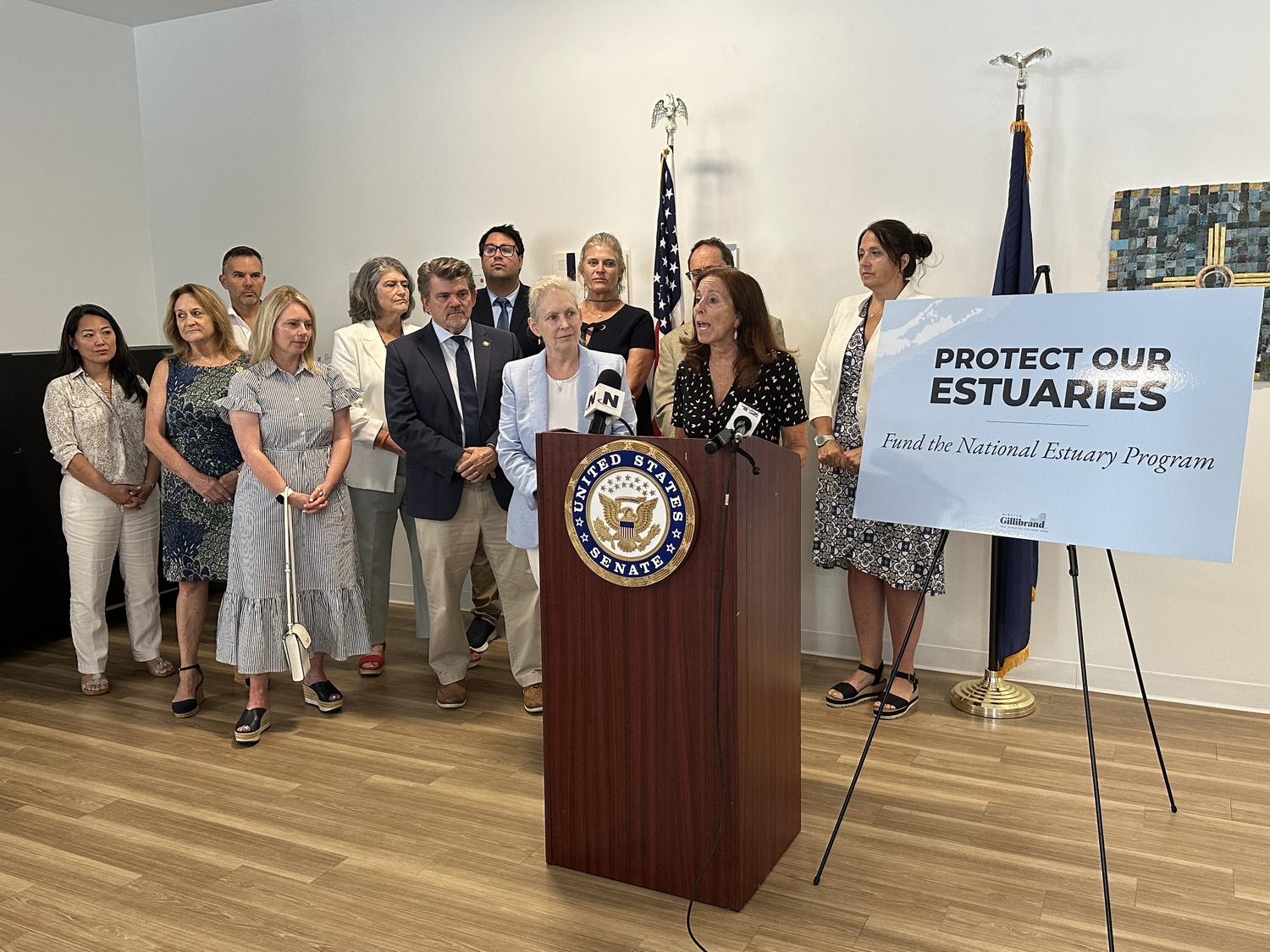 Adrienne Esposito, president of Citizens Campaign for the Environment speaking in Riverhead on Monday, July 21, about proposed budget cuts to the National Estuary Program. DAN STARK