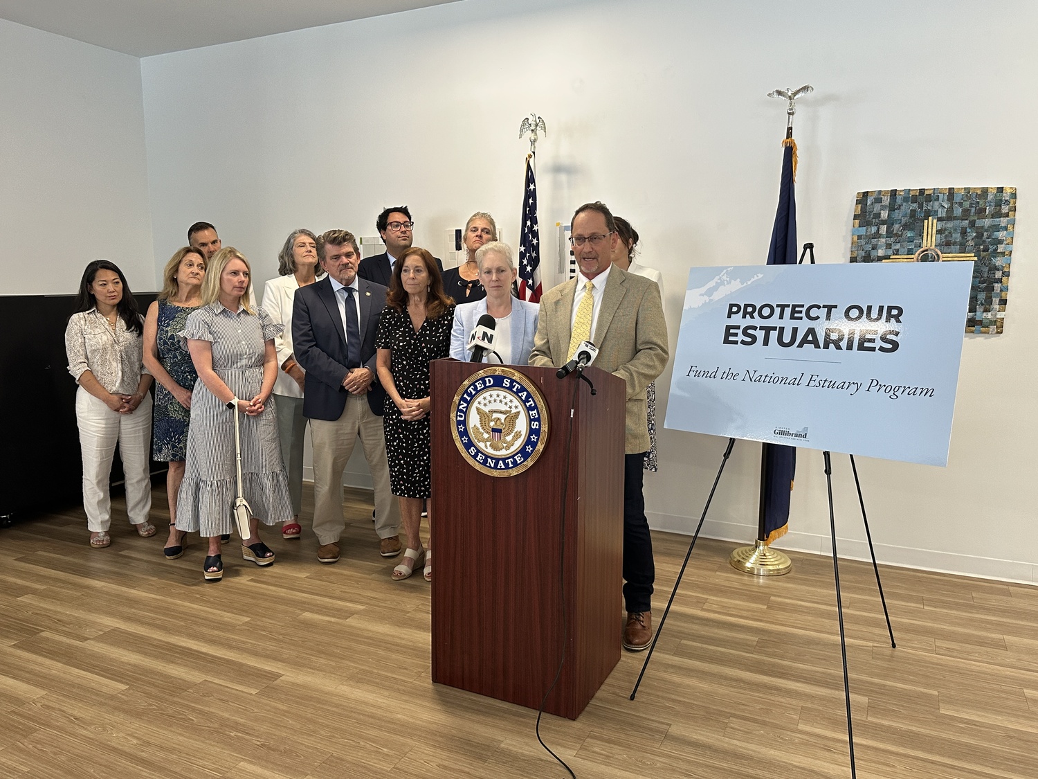 Bob DeLuca, president of Group for the East End, speaking in Riverhead on Monday, July 21, about proposed budget cuts to the National Estuary Program. DAN STARK