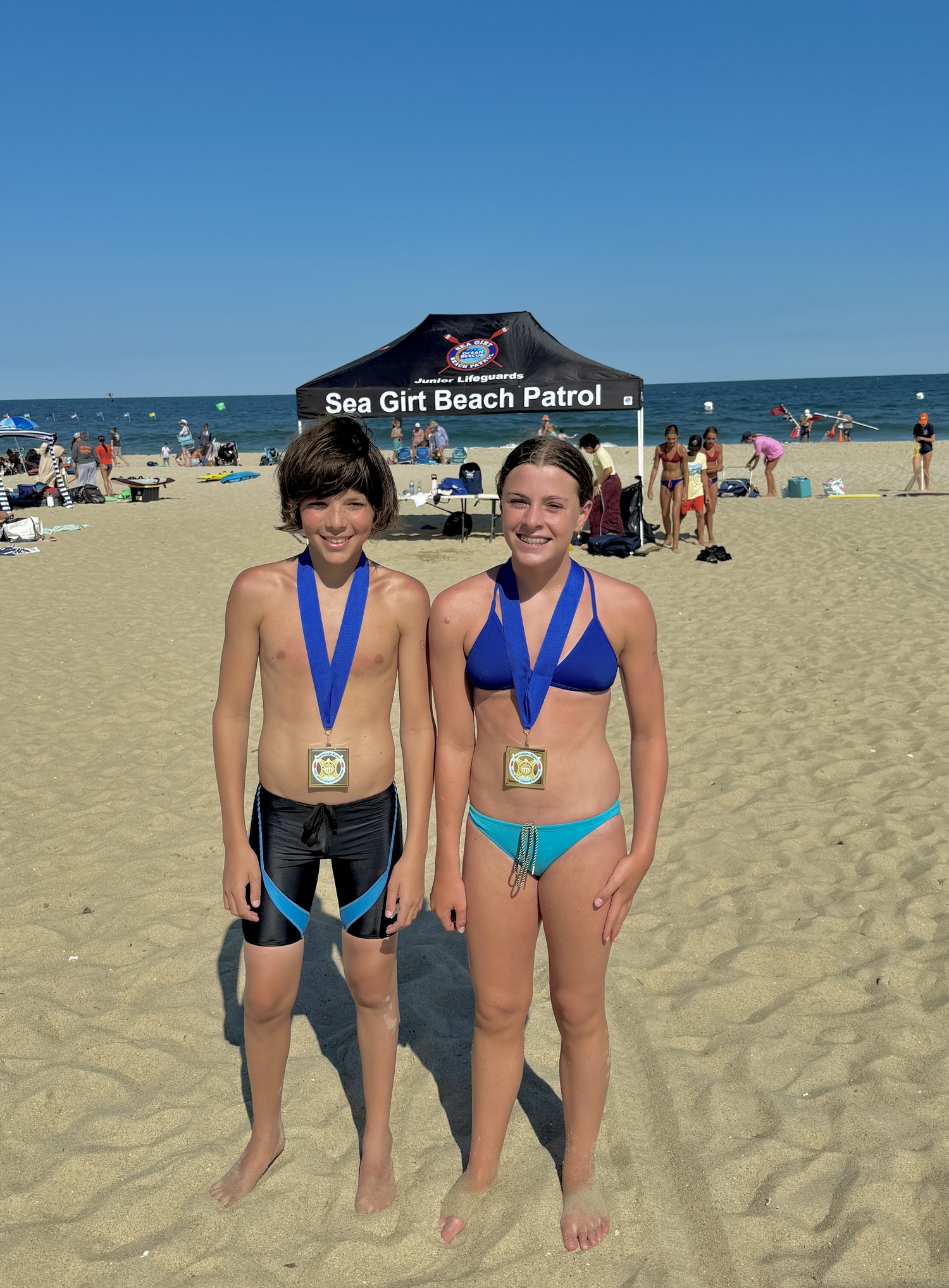 Liam Zucker and Heidi Rizzo with their medals.  COURTESY SEAN KNIGHT