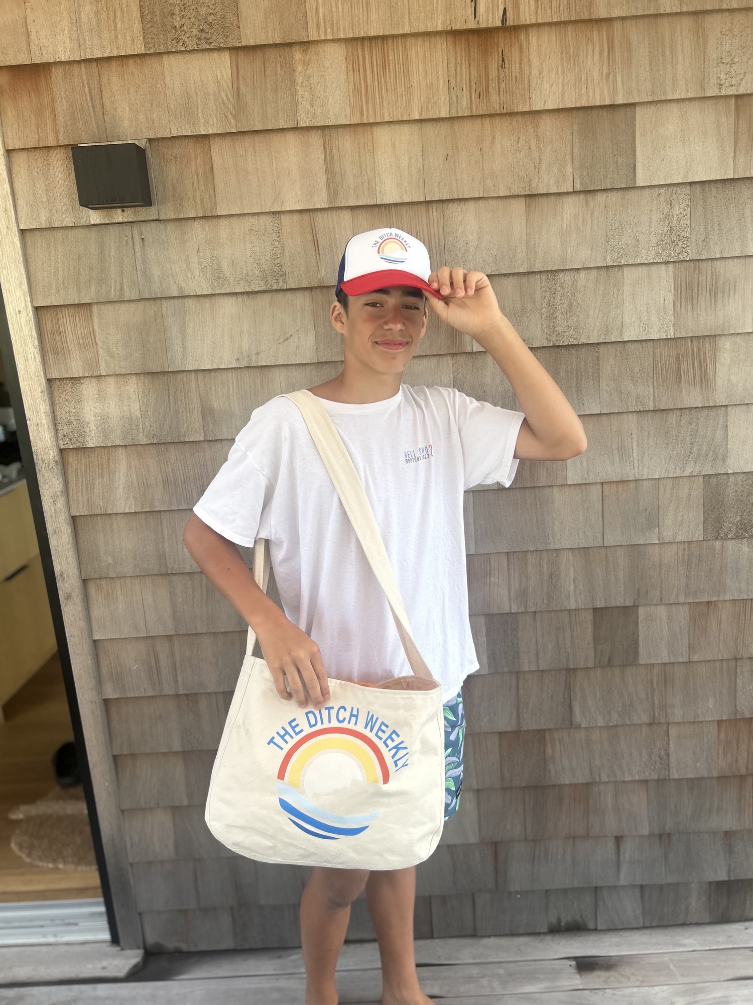 Harry Karoussos of The Ditch Weekly sporting the newspaper's merch. COURTESY BILLY STERN