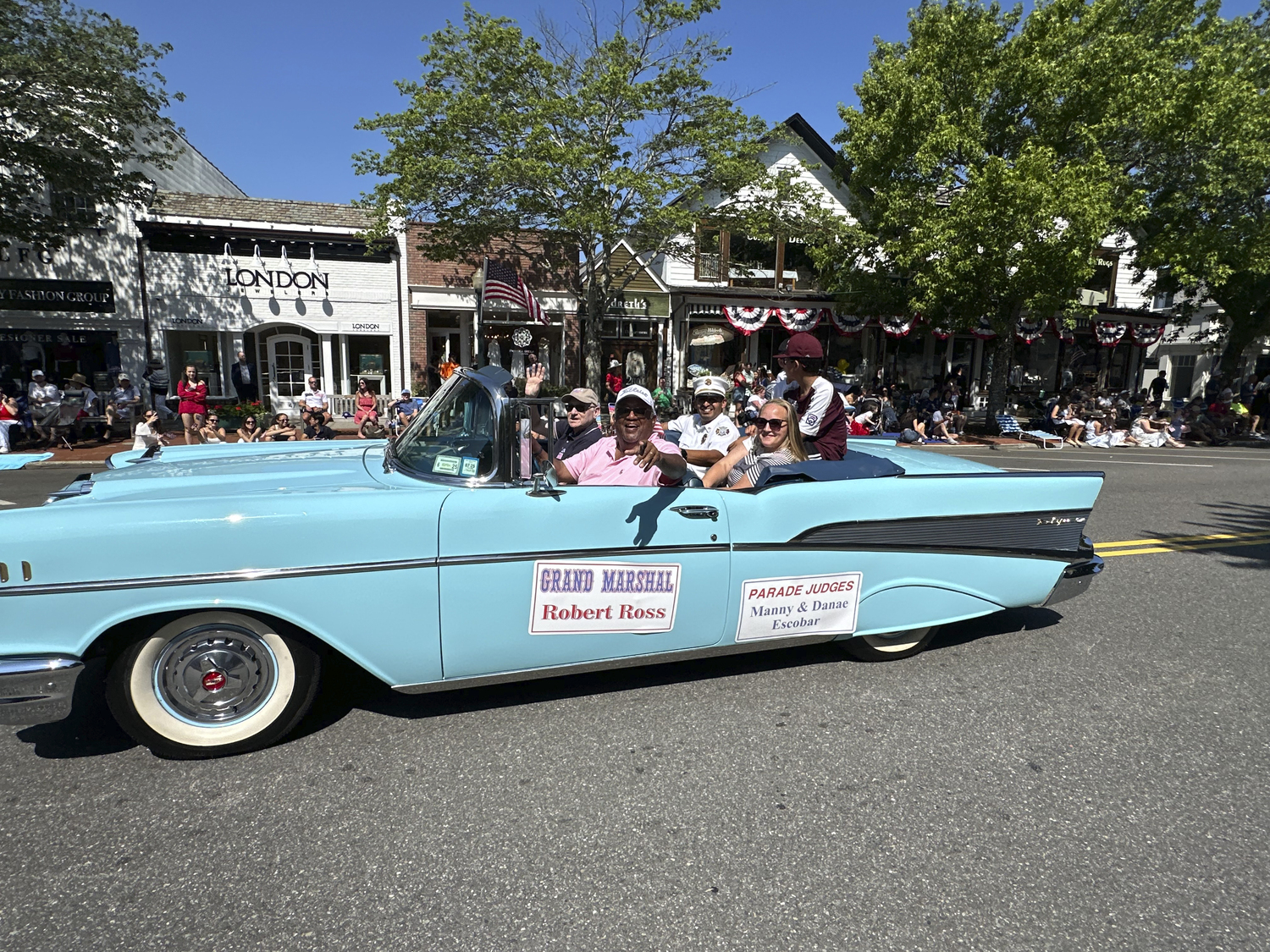 Brad Smith driving the Judges for Parade Grand Marshal Robert Ross and judges Danae and Manny Escobar.