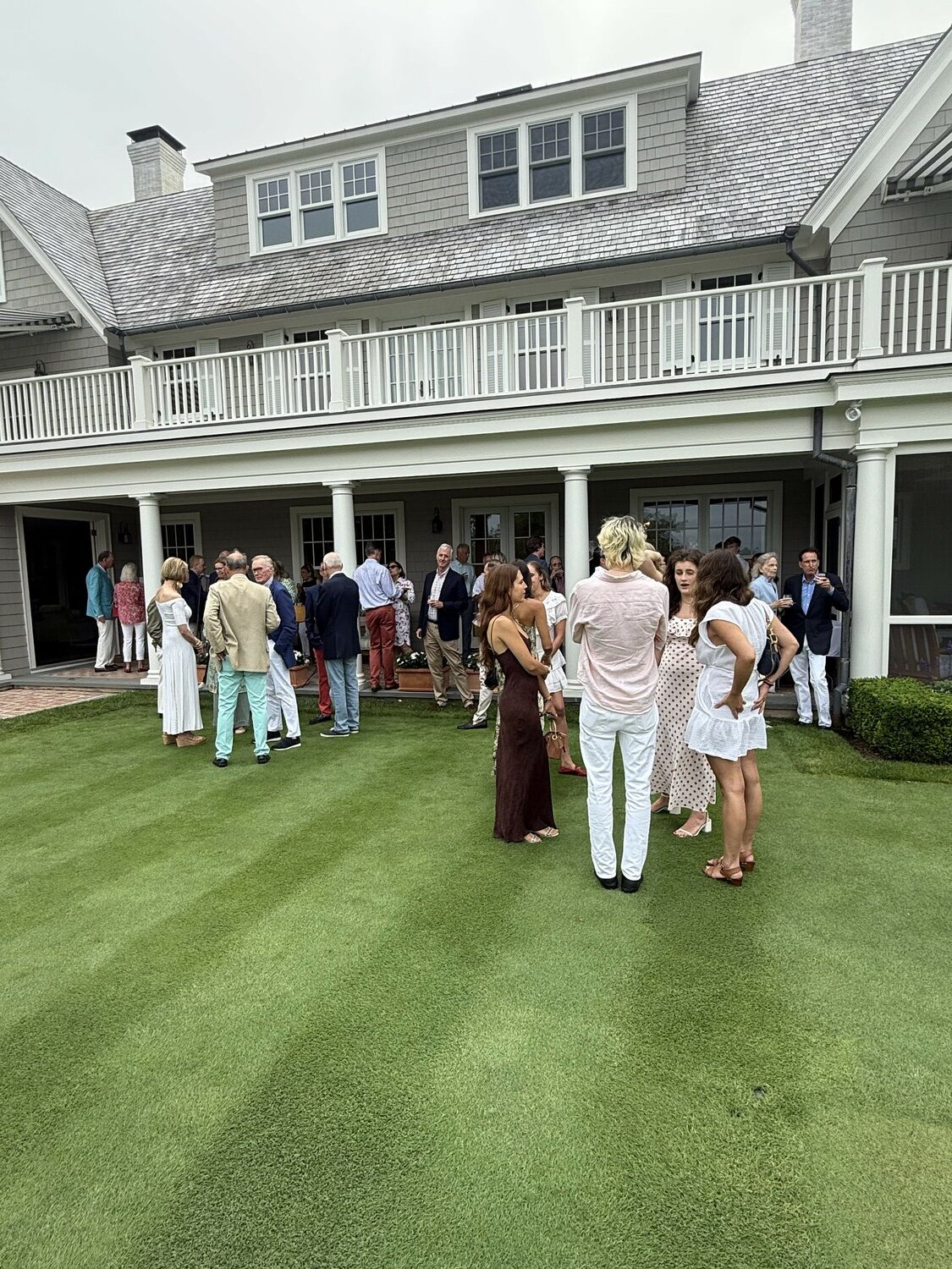 A fundraising event at the Giuffra home on Saturday in Southampton Village helped raise funds for the restoration of the World War I Memorial at Agawam Park. NANCY KANE