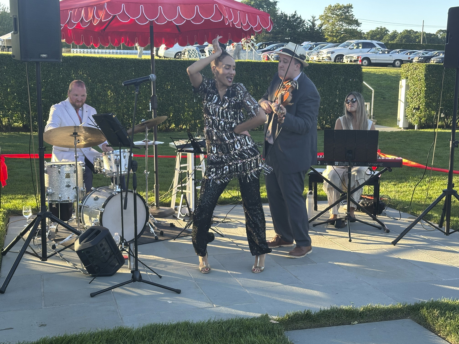 Jenn Jade performing for the guests at the French Heritage cocktail party.  GREGORY D'ELIA