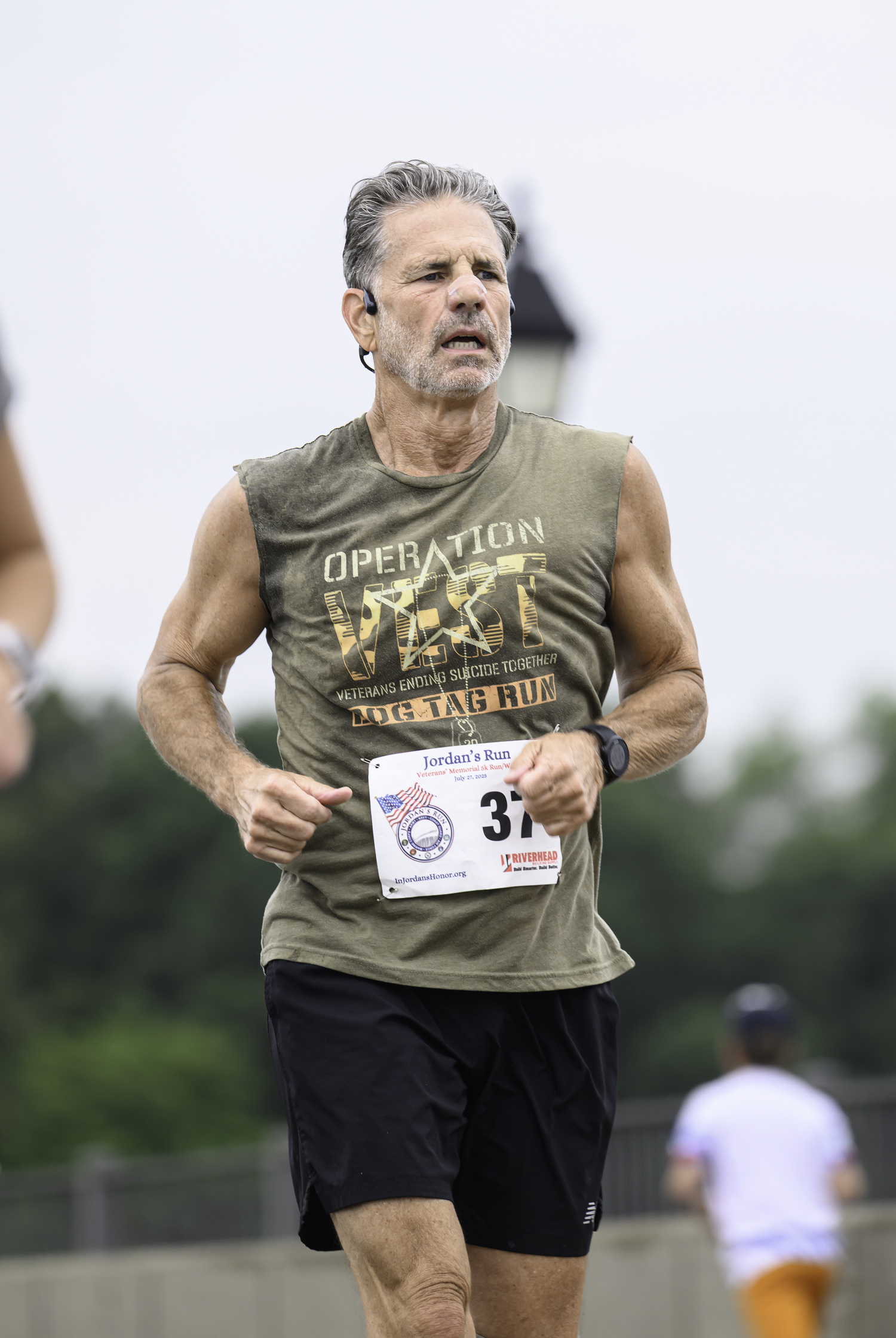 Glenn Murphy of Miller Place heads over the Lance Cpl. Jordan Haerter Memorial Bridge.  MARIANNE BARNETT