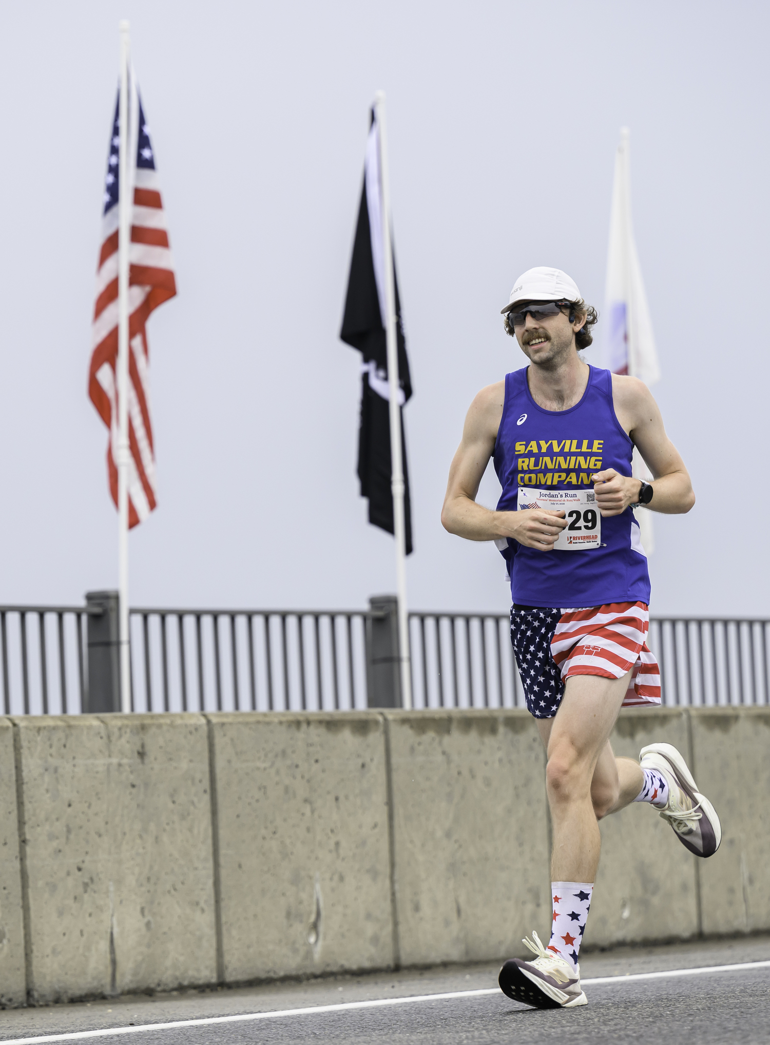 James Bercier of North Babylon heads over the bridge.  MARIANNE BARNETT