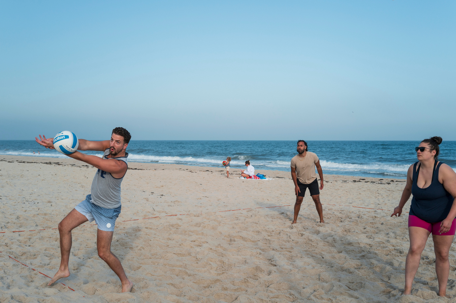 The 12 volleyball courts at Tiana Beach in Hampton Bays are packed on Tuesday and Thursday nights for leagues organized by East End Volleyball, which is on the cusp of its 50th anniversary. LORI HAWKINS