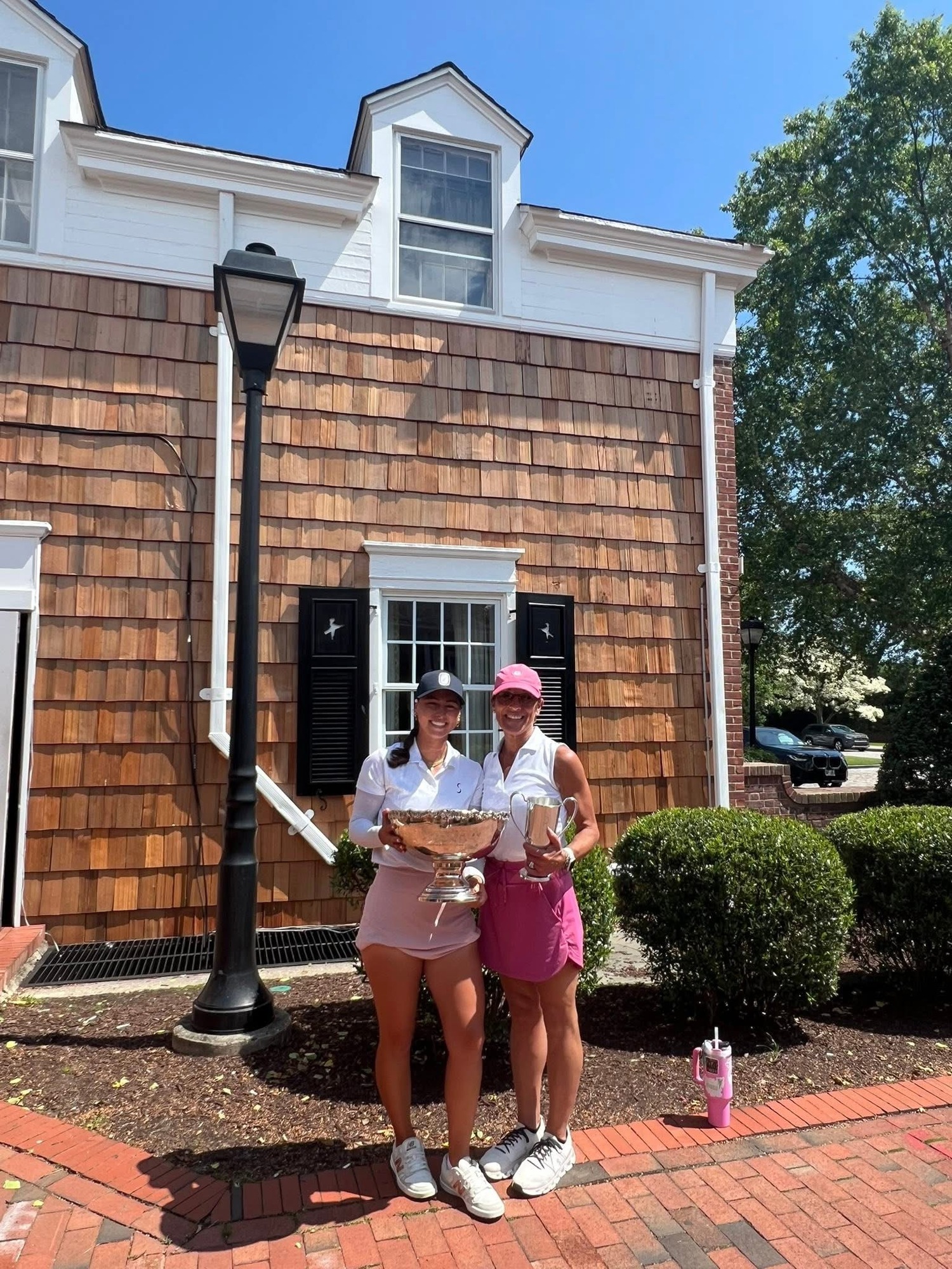 Mackenzie Tyler, left, with her mother Catherine Tyler after her big win on June 19.
