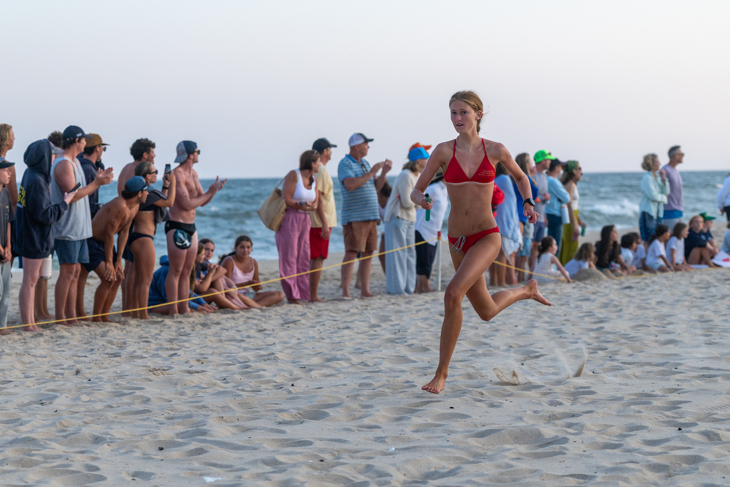 East Hampton Village lifeguard Sara O’Brien in the sprint relay.  RON ESPOSITO