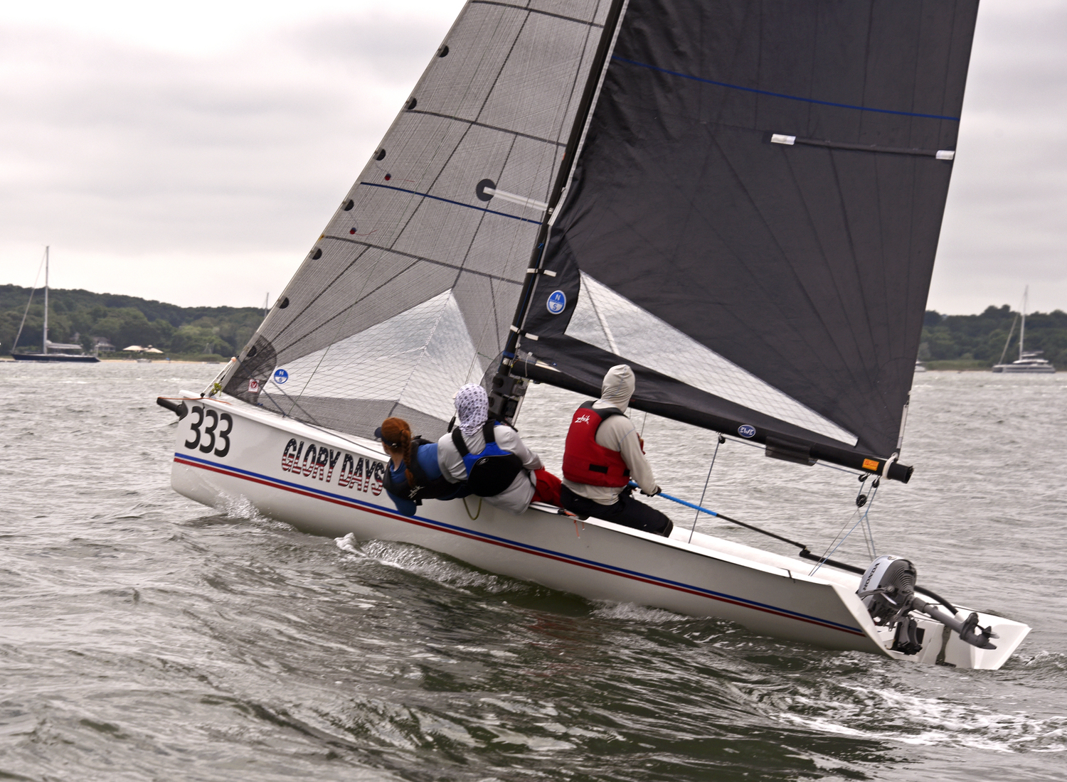 Lightning fast, with a hull that jumps up on a plane with ease, close-hauled while redhead Venetia Satow trims the jib, Shaun Stewart on the mainsheet and skipper Peter Beardsley driving. Glory Days, a Viper 640, was awarded both first in Division 1 and first with all three division combined. They took home GOLD!  MICHAEL MELLA
