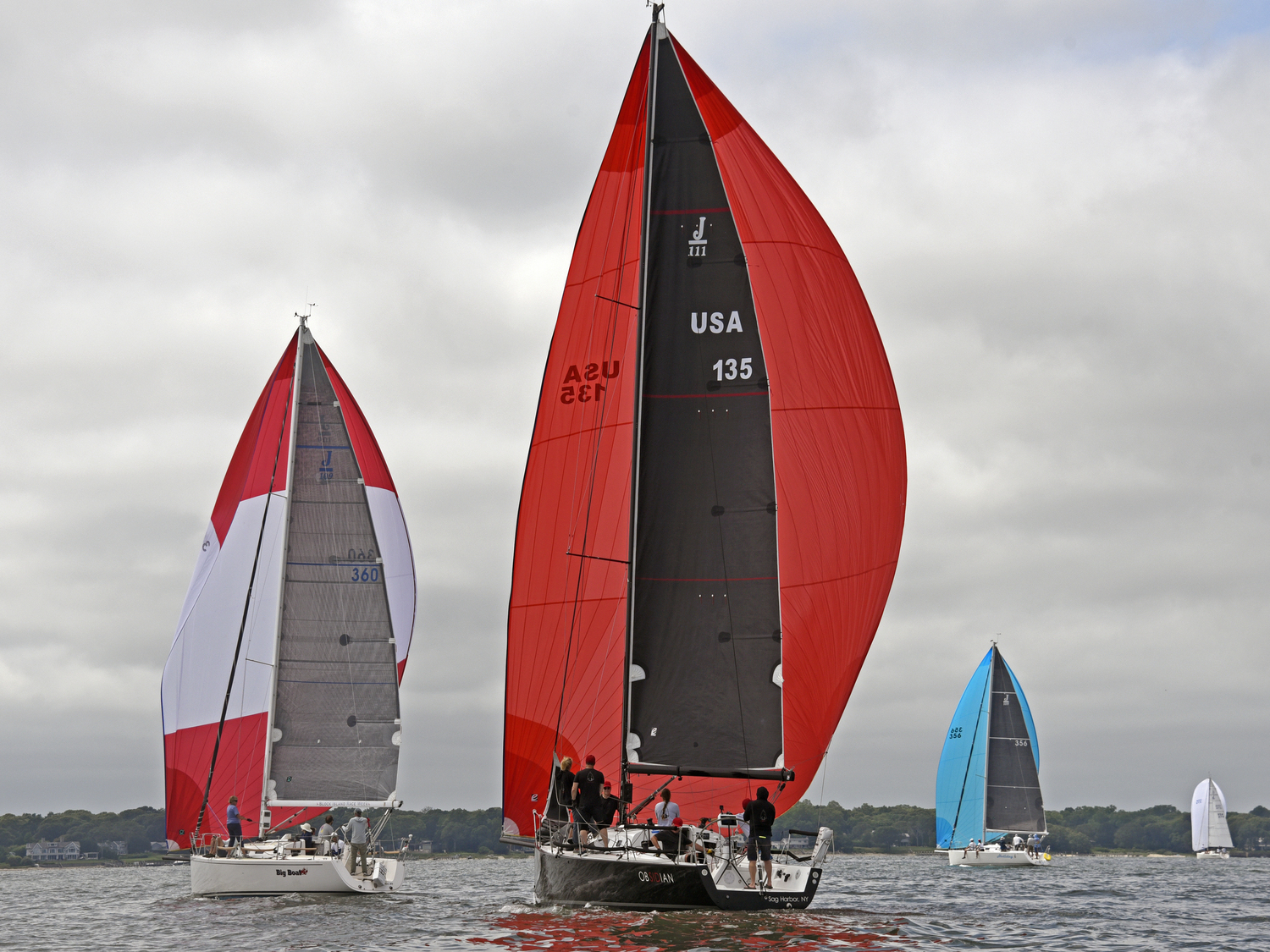 From left, Big Boat, Obsidian, Holiday and Gossip all enjoying leisurely spinnaker runs a mile east of Sag Harbor.  MICHAEL MELLA