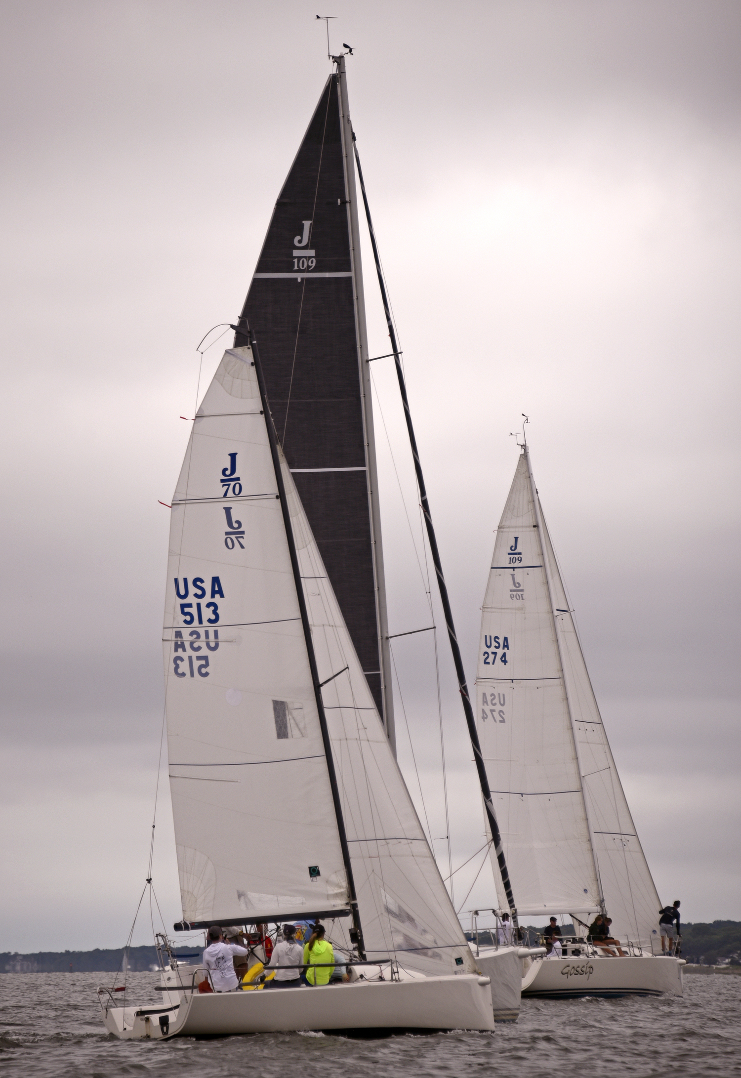 Sinéad FitzGibbon at the tiller of Breakwater’s “all women” J-70, is sorting it out with two much larger J-109s before the start in Noyack Bay.  MICHAEL MELLA