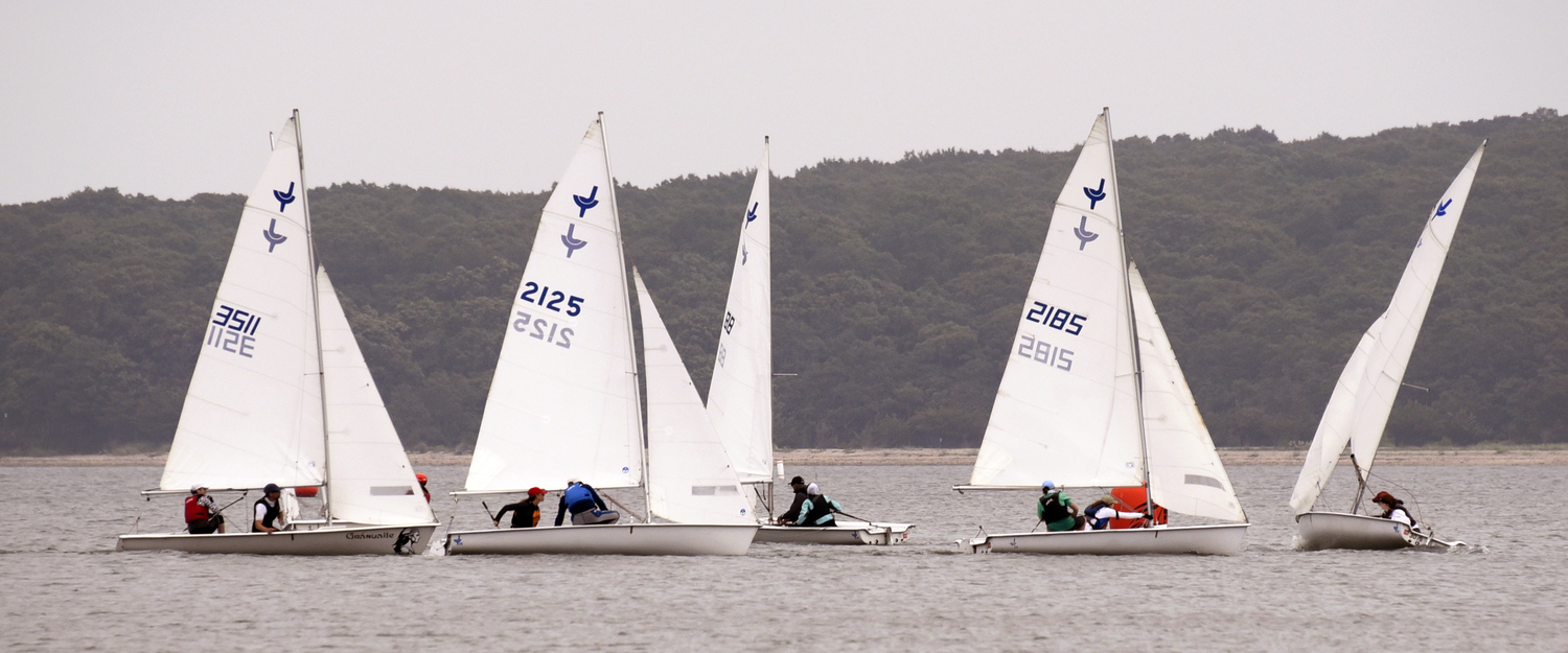 From left, Sinéad FitzGibbon, Charlotte Papin, Joan Butler, Caitlin Cummings and first place Venetia Satow deftly executing gibes around the weather mark.  MICHAEL MELLA