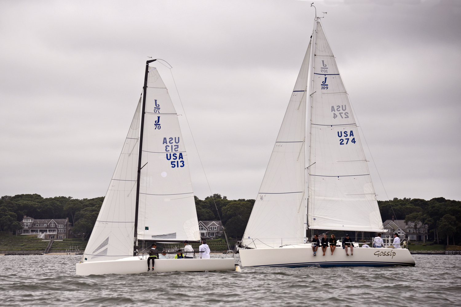 From left, the “all women” J-70, with Joan Butler perched on the rail and Sinéad FitzGibbon at the helm checking sail trim, briefly leading Gossip.  MICHAEL MELLA