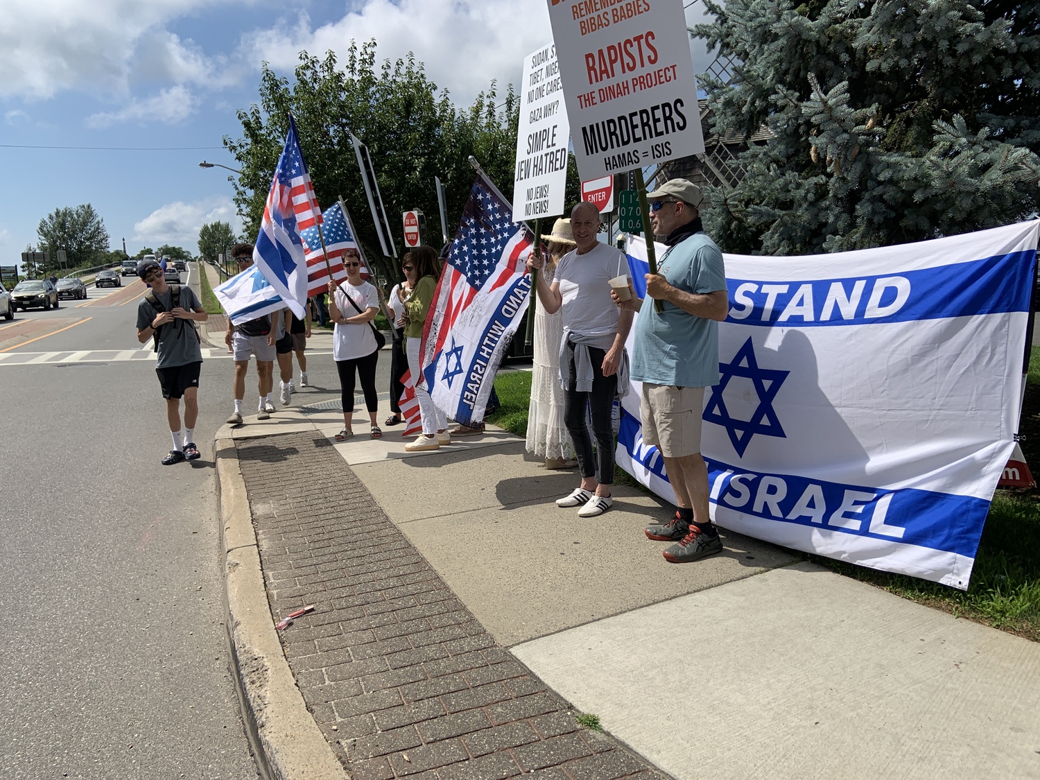 A group supporting Israel has been gathering to counter those holding a peace vigil in Sag Harbor every Sunday afternoon. STEPHEN J. KOTZ