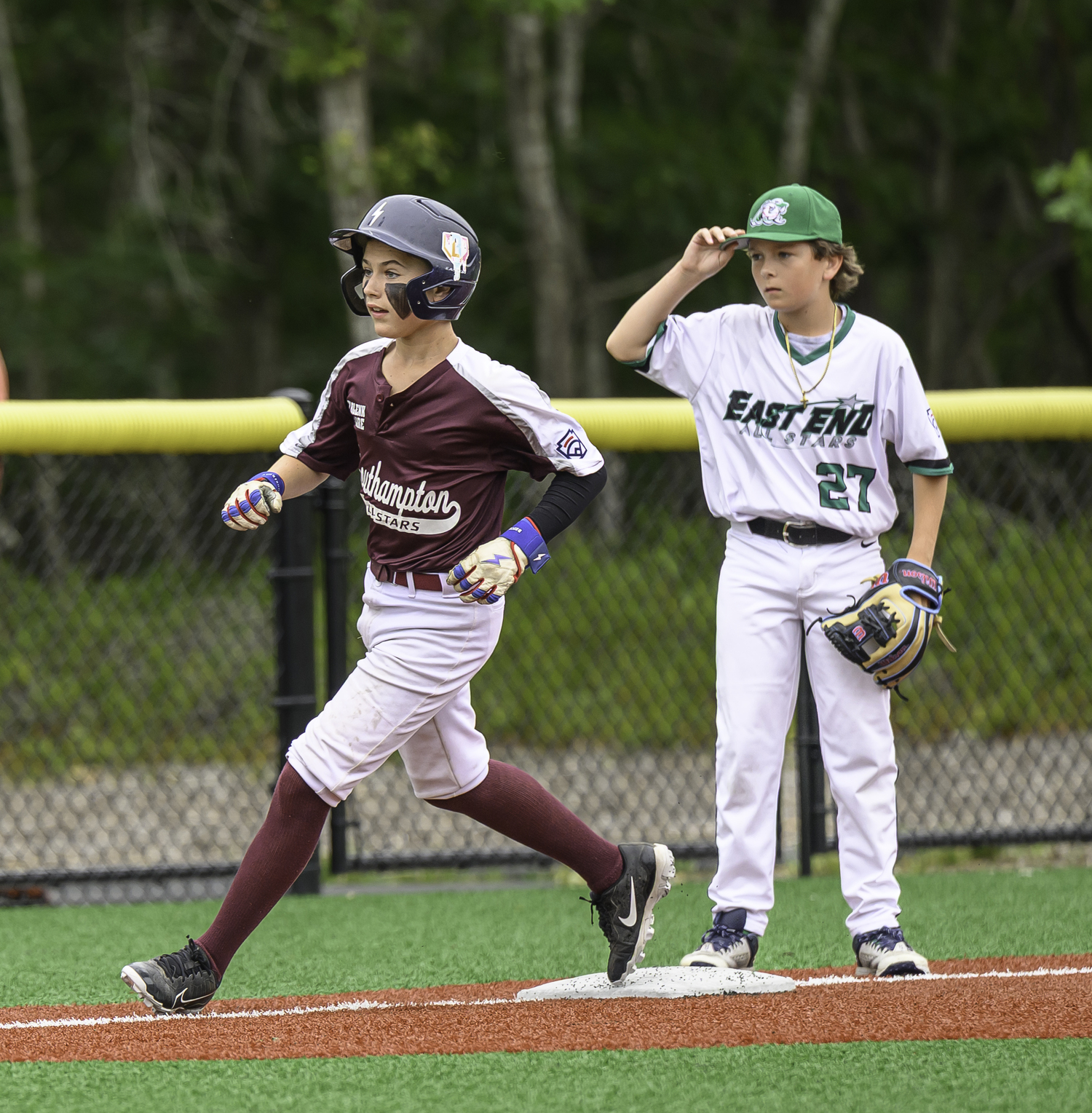 Nico Souhrada rounds third base.  MARIANNE BARNETT