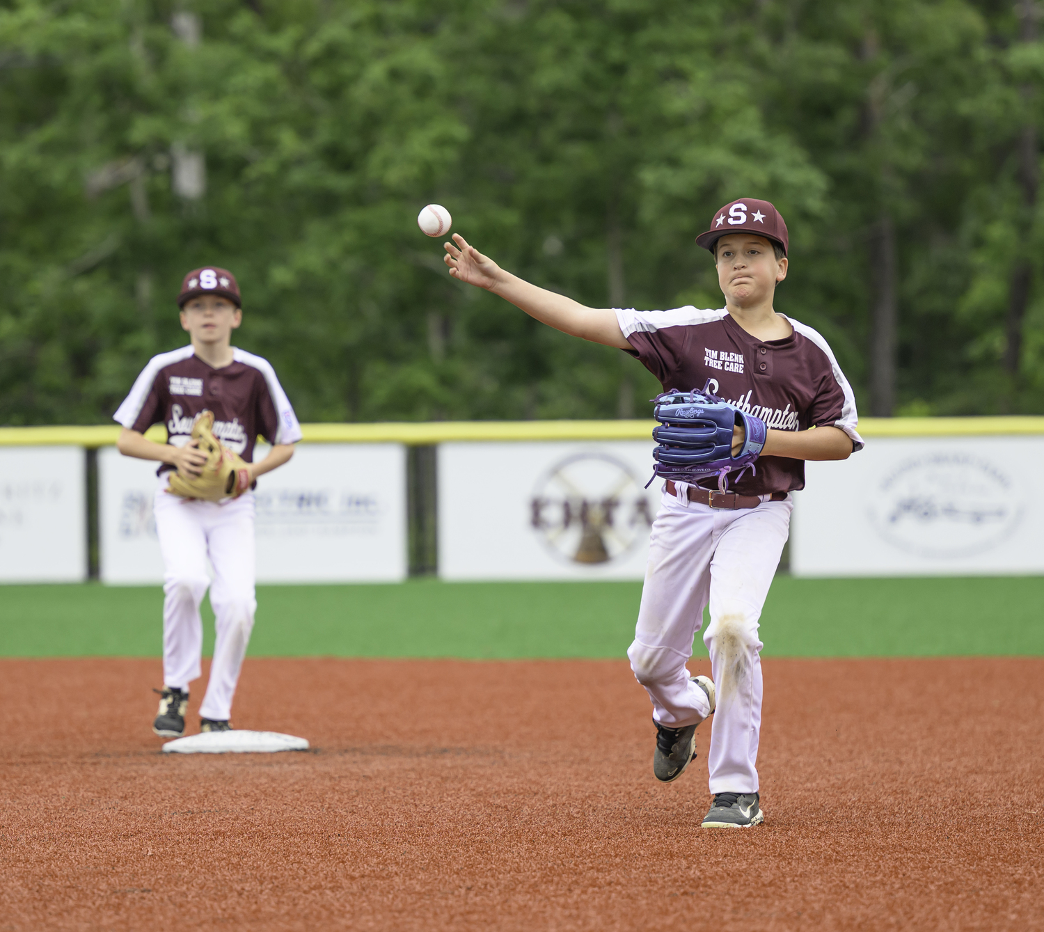 Southampton second baseman James Crosby throws to first base.  MARIANNE BARNETT