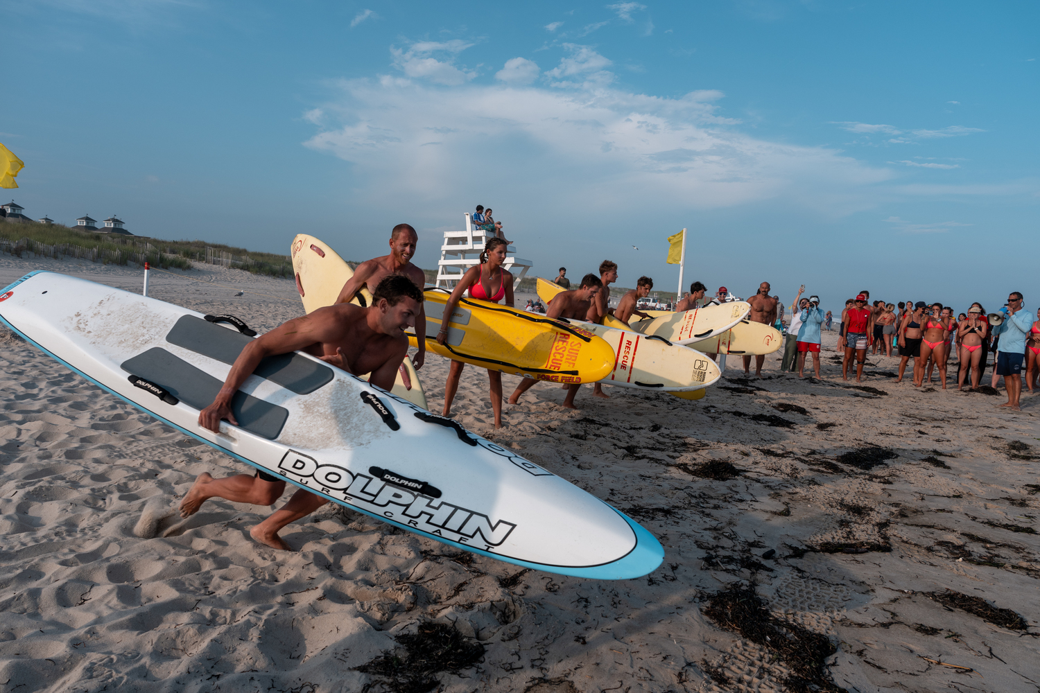 Jack Duryea, with Dan Garvey and Kiley Kaiser behind him, in the paddle board rescue race. RON ESPOSITO