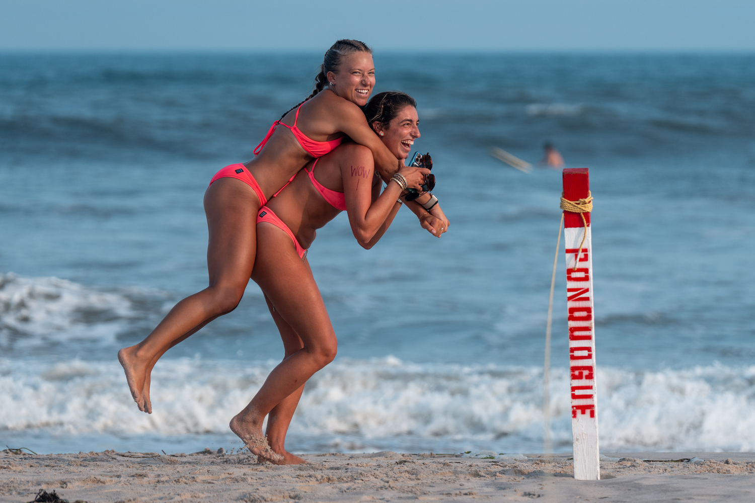 Isabella Natarelli pulls Lizzie Knieriemen on her back.  RON ESPOSITO