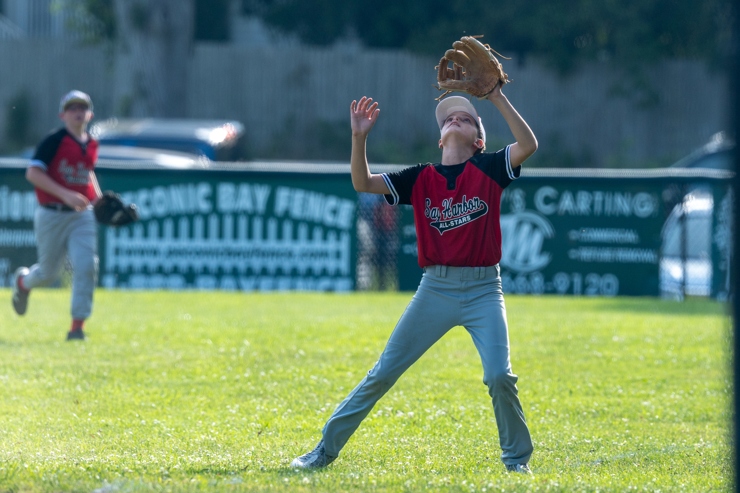 Grady Craig tracks down a fly ball  RON ESPOSITO