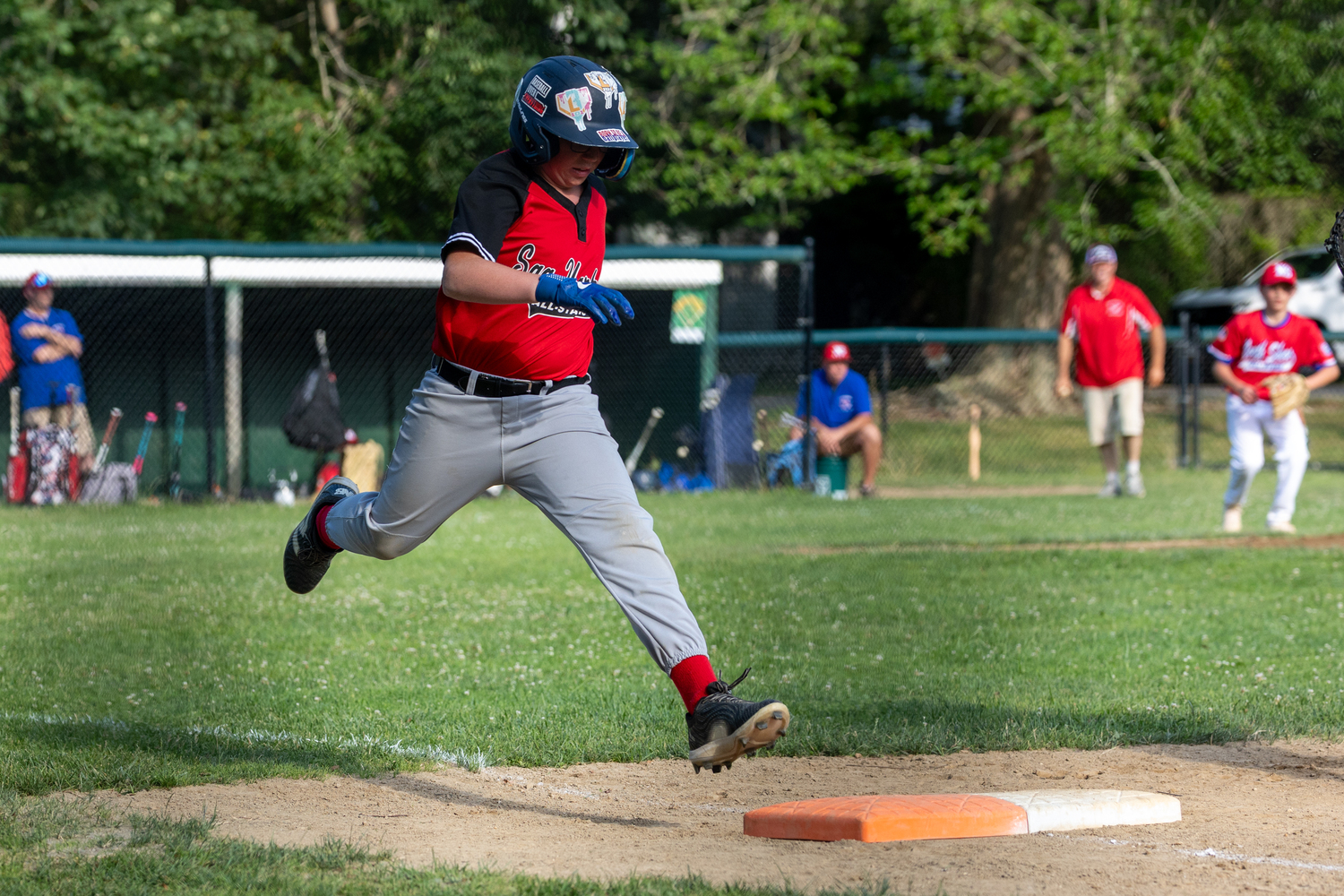 Enza Mazzeo tries to beat out a play at first base.  RON ESPOSITO
