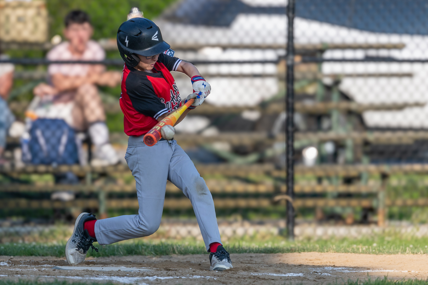 James Ziglar makes contact with a pitch.  RON ESPOSITO