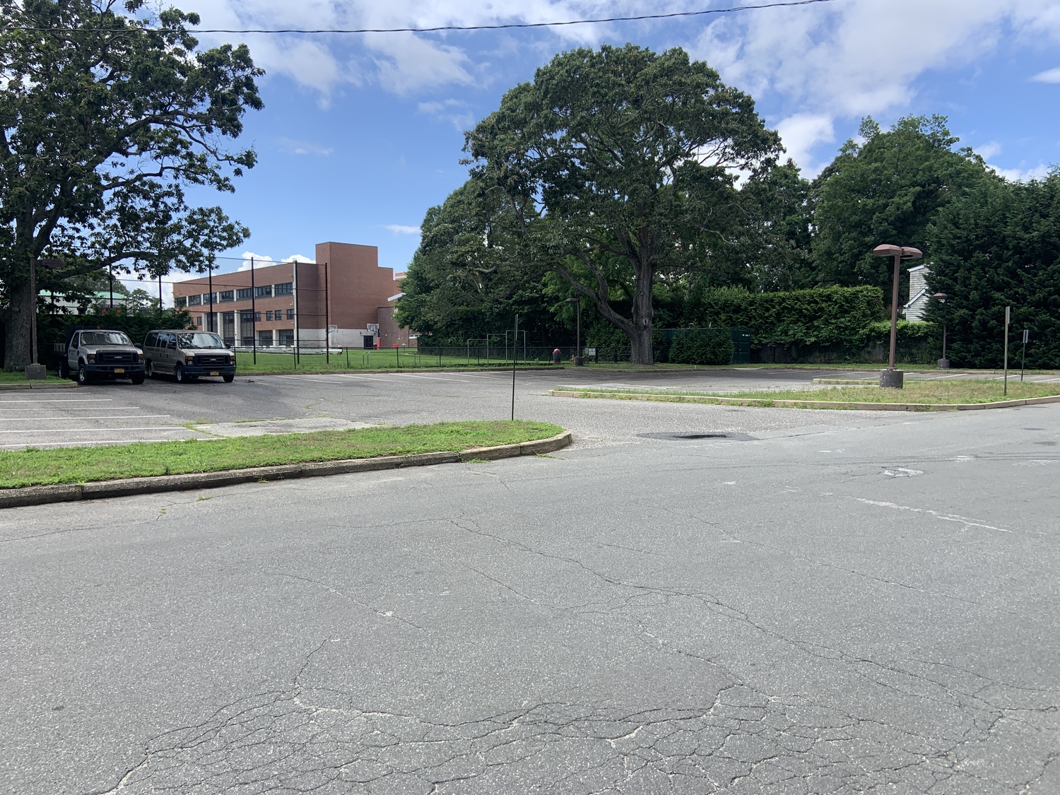 The Montauk Avenue parking lot behind Pierson High School was empty on Monday, even though it is available for employee parking. STEPHEN J. KOTZ