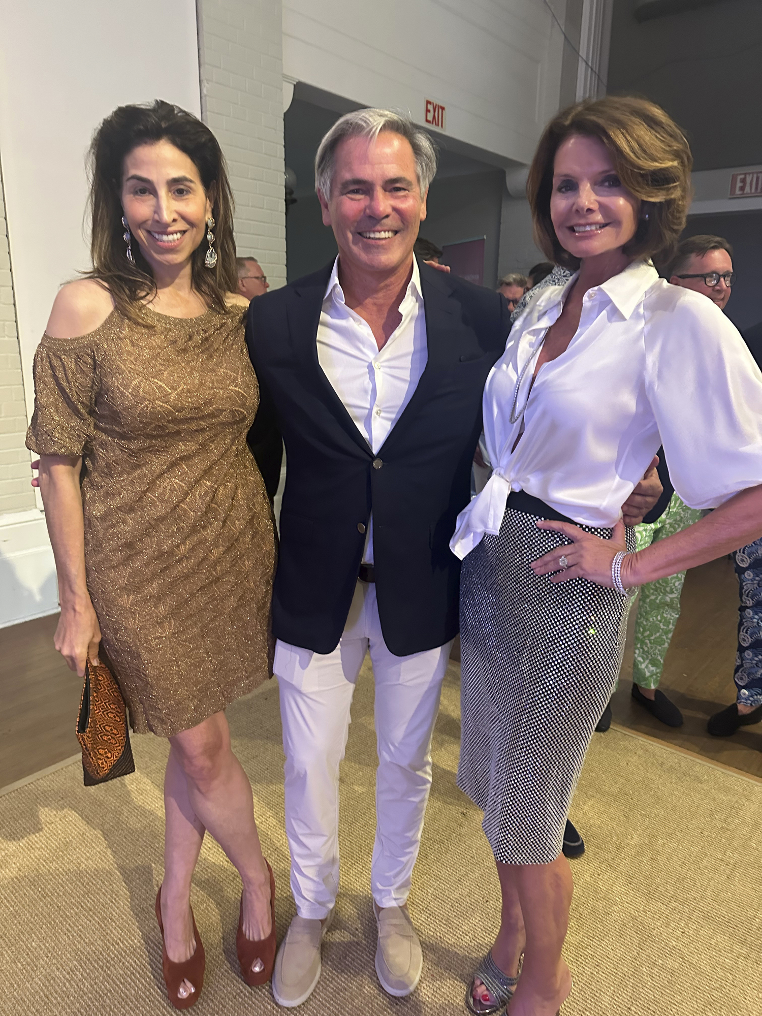 Alex Stanton, Rudy and Lydia Touzet at the Southampton Arts Center.  GREGORY D'ELIA