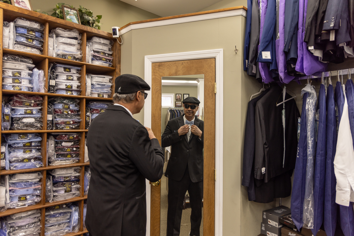 Avery Dennis Jr., a member of the Shinnecock Indian Nation, gets fitted for a tuxedo in anticipation of a prom party for the Southampton High School class of 1978. LINDSAY MORRIS