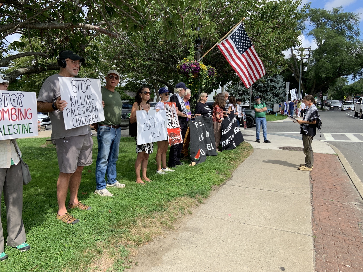 Participants in a peace vigil have been meeting every Sunday in Sag Harbor to call for a ceasefire in Gaza. STEPHEN J. KOTZ