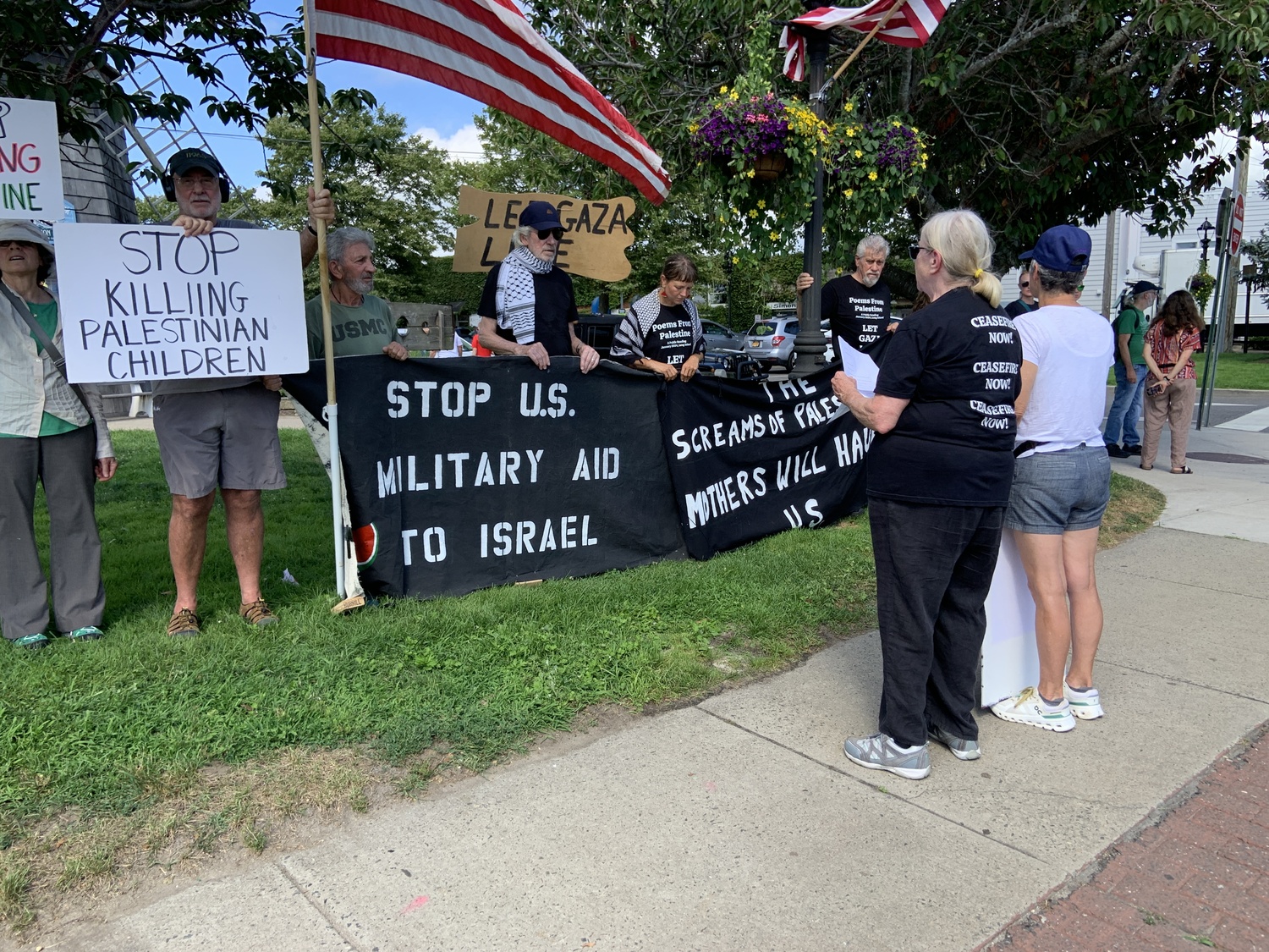 The rock star Roger Waters, in black cap, joined a vigil for peace in Gaza on Sunday. STEPHEN J. KOTZ