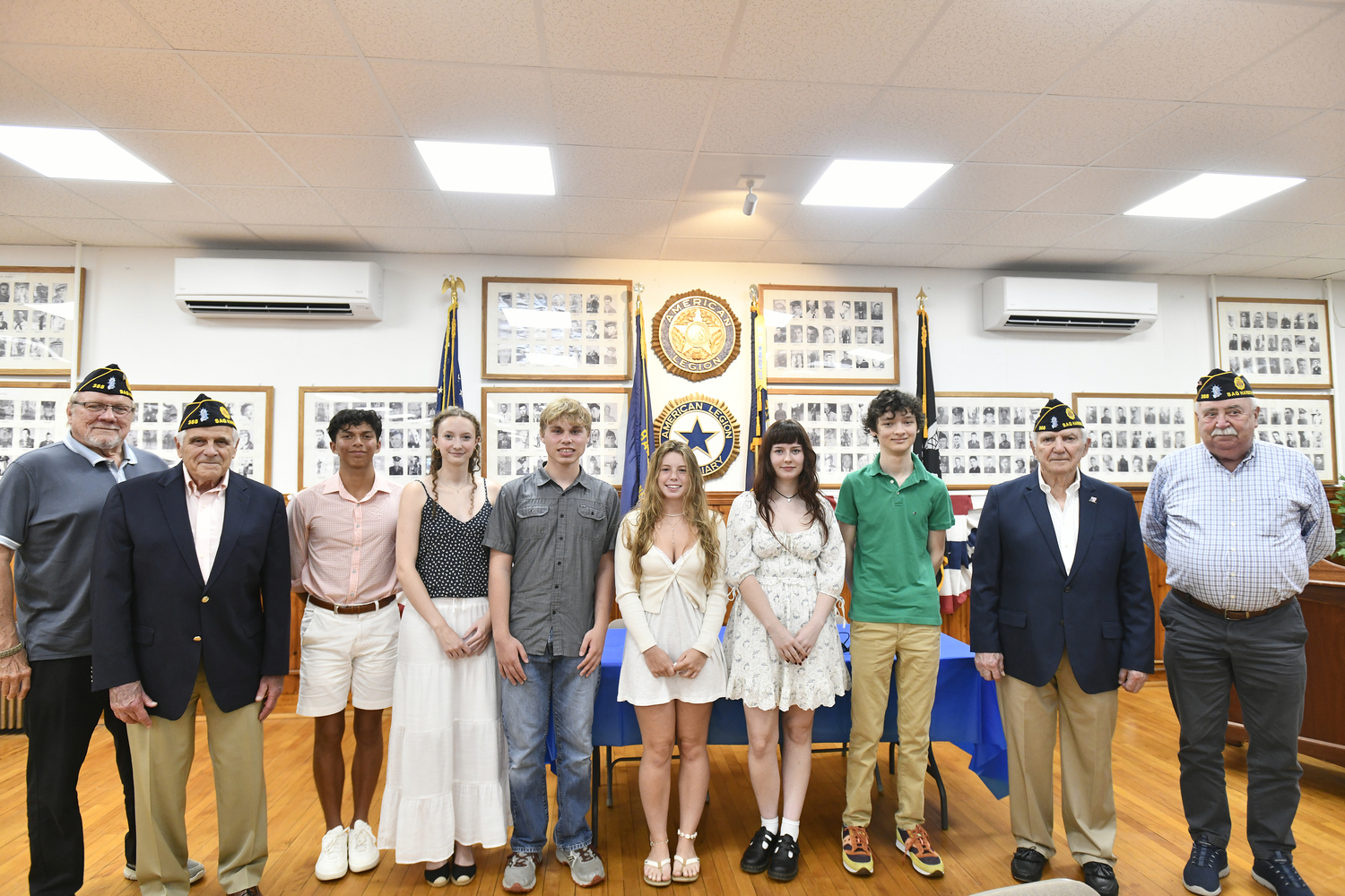 American Legion Chelberg & Battle Post #388 in Sag Harbor recently awared Pierson High School graduates with scholarships. Left to right are Greg Keramis and John Aredt of the American Legion; Edmar Gonzales-Nateras, Andy Neidnig Athletic Scholarship, $1,000; Hanna Donahue, Dolores Zebrowski Nursing Scholarship, $1,000; Robert Browngardt Community College Scholarship, Jack Mather, $1,000;  Chelberg & Battle Post #388 Veterans Scholarship, Fiona Martin, $2,500; Chelberg & Battle Post #388 memorial Scholarship, Quinn Cole, $5,000; Ralph springer Music Scholarship, Kai Basseches, $1,000; and Legion members Jack Prizzi and Richard Nesi. Missing from photo; David Kriegsman, RADM Charles Schreier Academic Scholarship, $1,000.    DANA SHAW SHAW