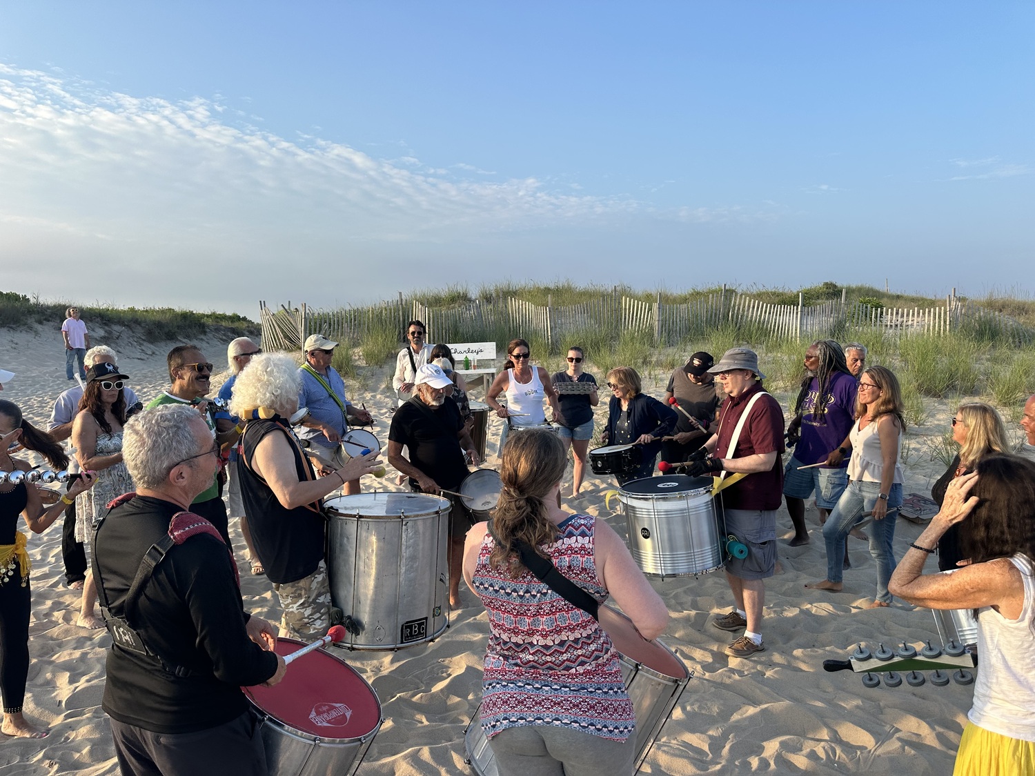 Members of Escola de Samba Boom put on their weekly drum circle at Sagg Main Beach on Monday night, with the benefit of parking passes for non-resident attendees that were paid for by Jay Schneiderman, one of the group's founders and a former town supervisor. But Schneiderman said that the current Town Board seems to be trying to put an end to the drum circles by insisting that the group get permits for the informal gatherings and pay for parking passes for non-resident members despite parking at town beaches after 6 p.m. traditionally not requiring a permit.