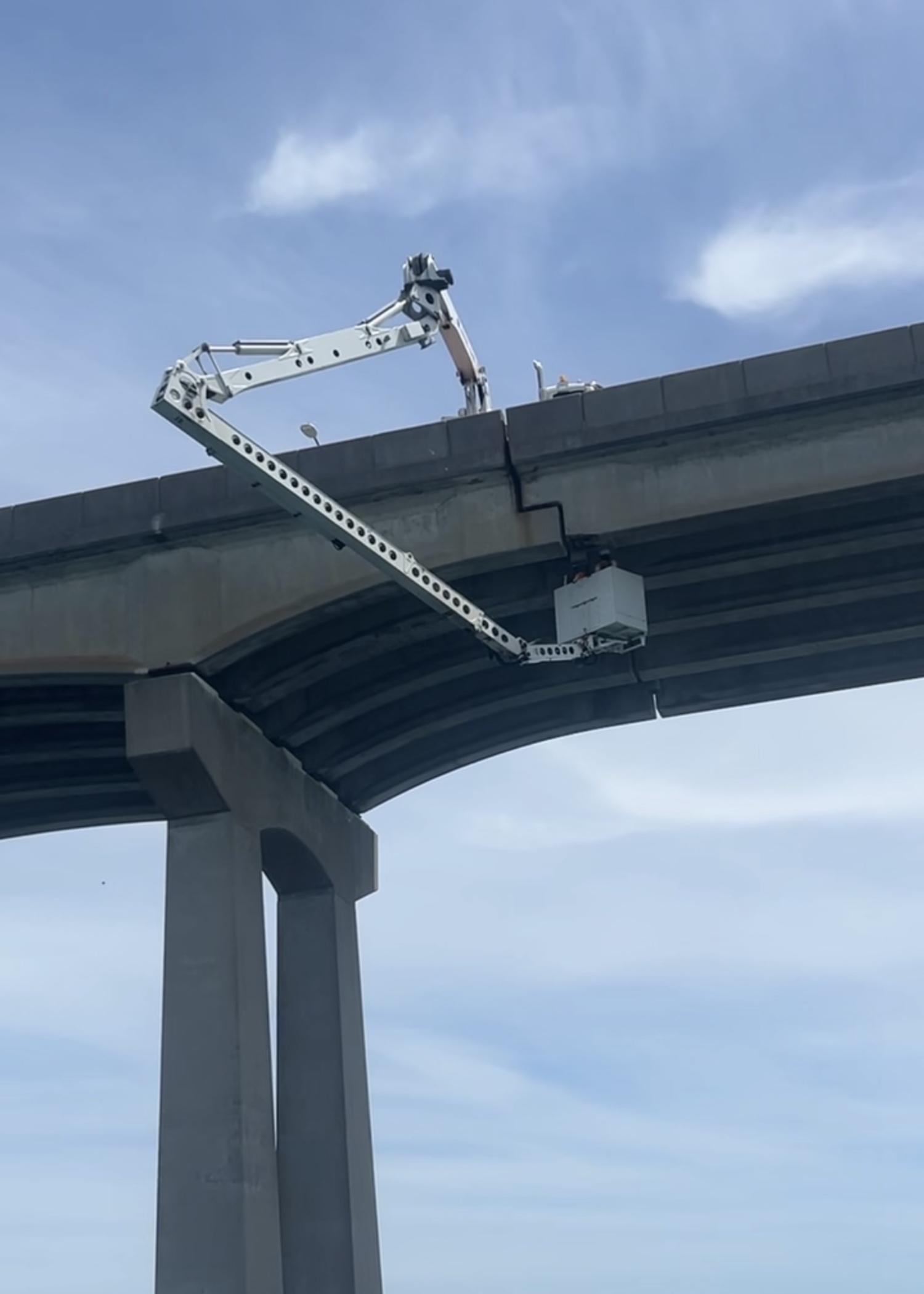 Engineers will use an under-bridge inspection truck to conduct extensive new analysis of the deterioration of concrete in the Ponquogue Bridge over the next two weeks. CAPT. BRAD RIES