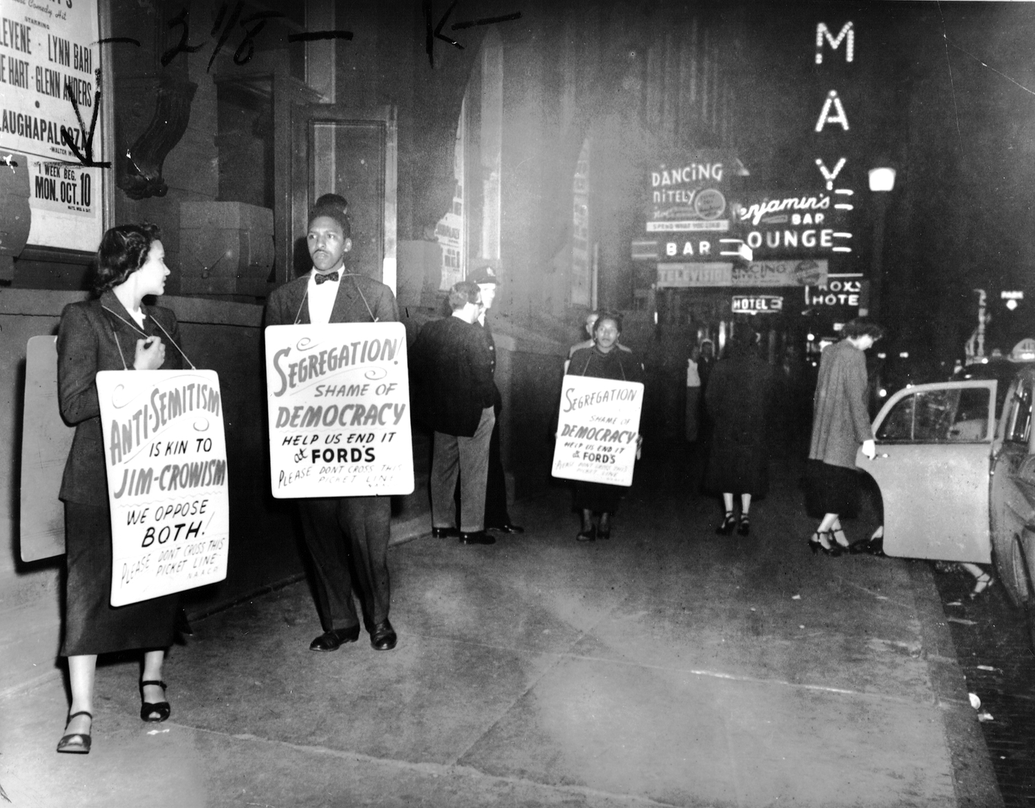 Bayard Rustin, Mrs. Bowen Jackson, and Mrs. Earl Williams picket Ford Theatre in Baltimore Maryland, 1948. NAACP COLLECTION / LIBRARY OF CONGRESS.