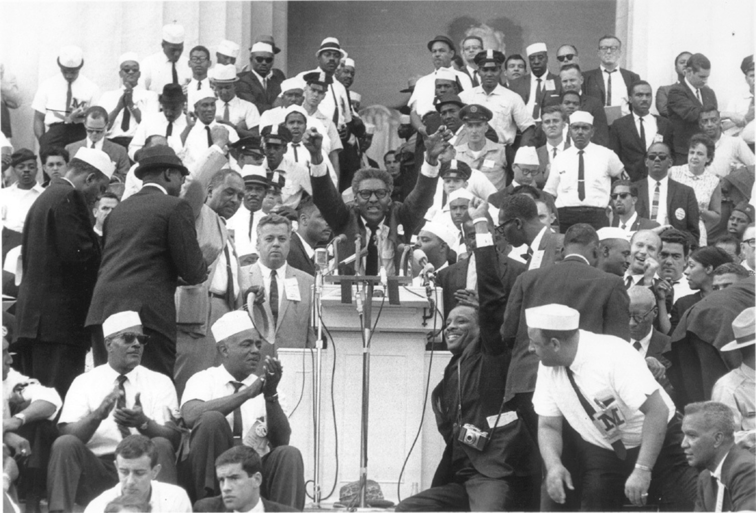 Bayard Rustin delivering the official demands at the March on Washington for Jobs and Freedom, August 28, 1963. BETTMANN ARCHIVE.