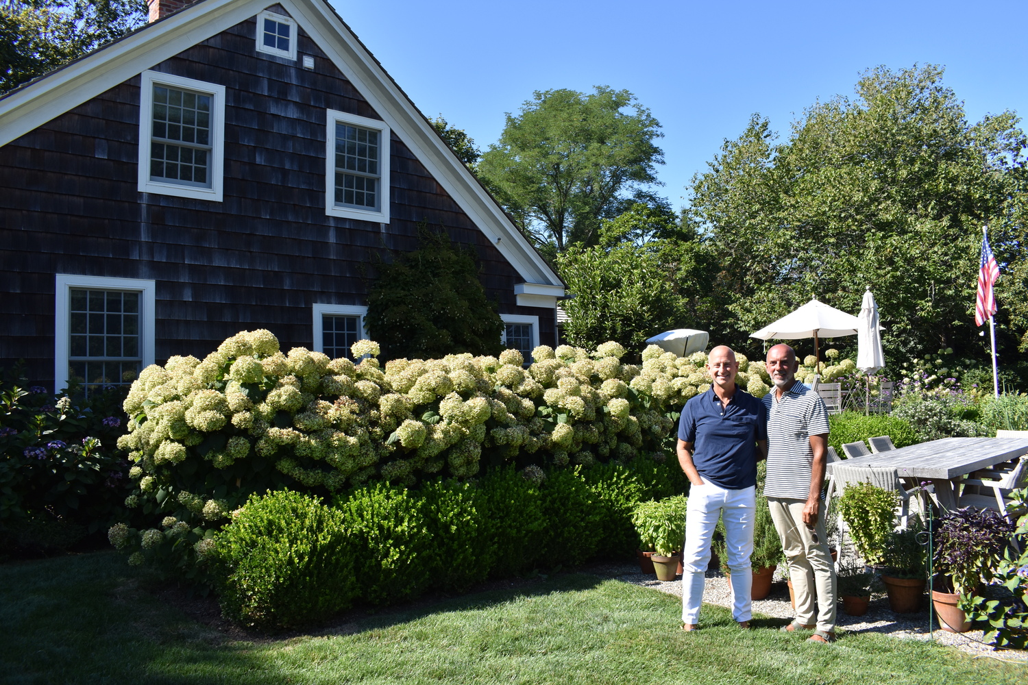 Anthony Squatrito and Paul Horn at their Water Mill home, which will be featured in the Southampton History Museum's Insider's View home and garden tour.  BRENDAN J. O'REILLY