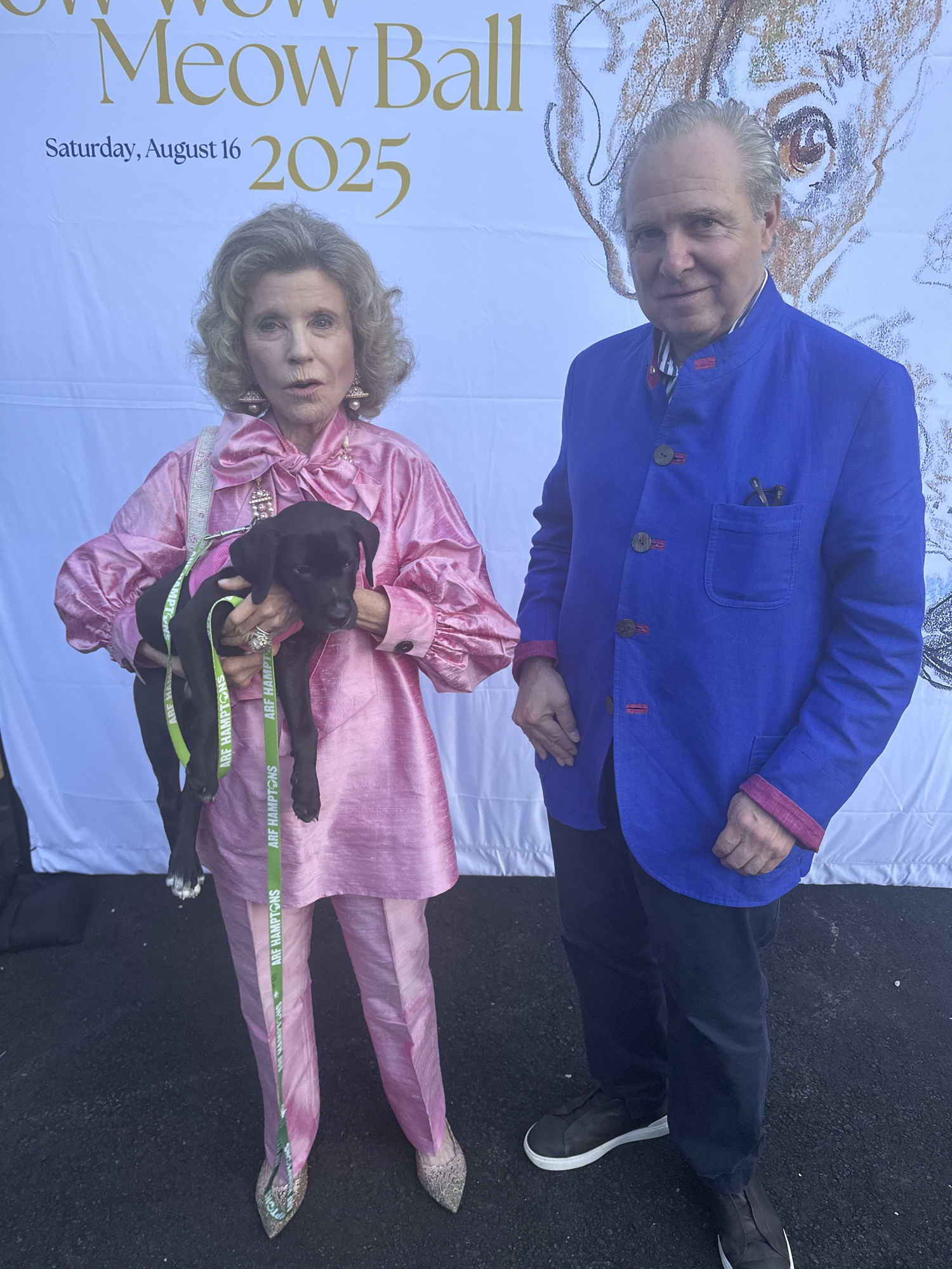 Kathy Rayner holding Ethan with Bradley Lander at the Bow Wow Meow Ball. GREGORY D'ELIA