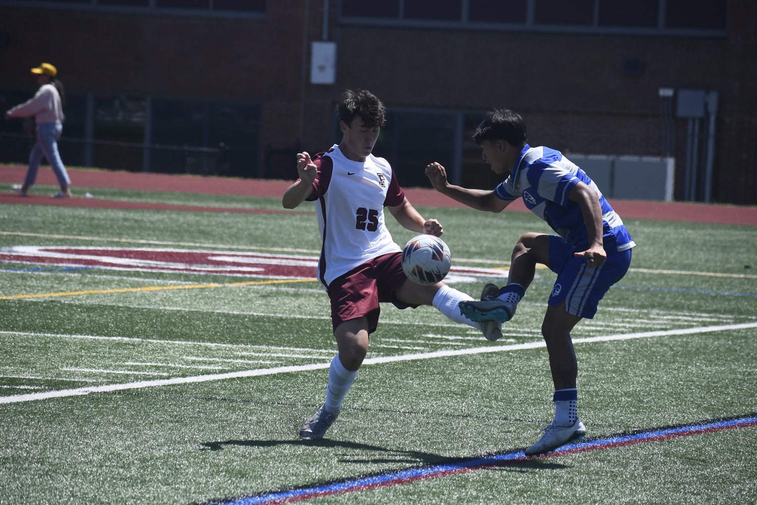 Fordham freshman Joseph Maimone tries to clear the ball while battling a Seton Hall player.  DREW BUDD