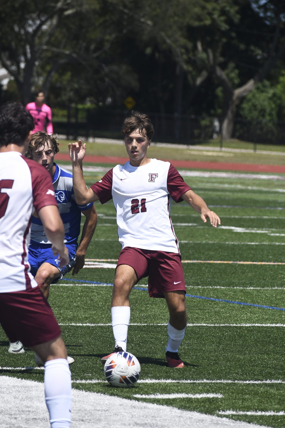 Fordham junior Elias Betancourt passes the ball.  DREW BUDD