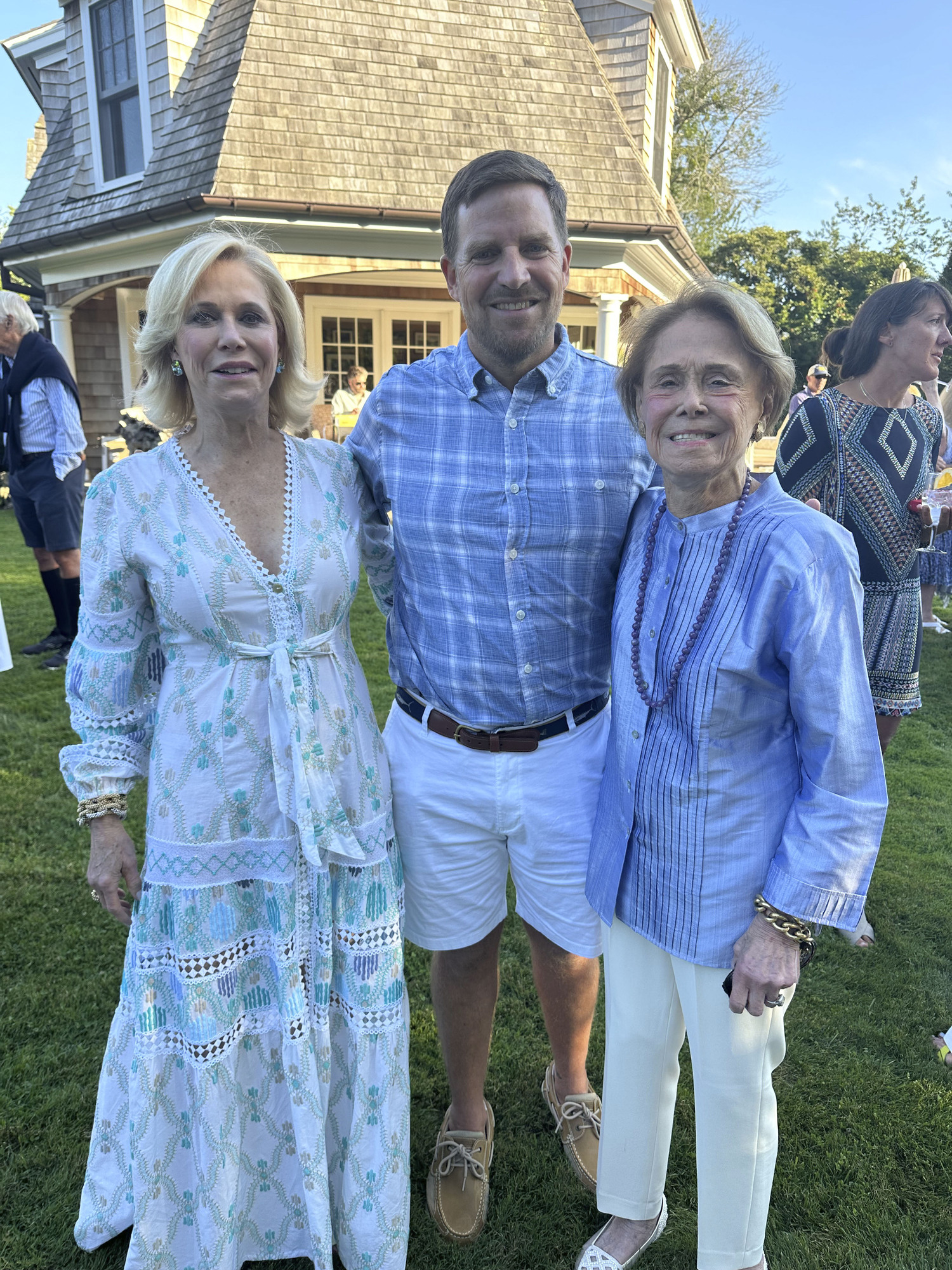 Kim White, Peter Topping and Adrienne White at the Peconic Baykeeper cocktail party.    GREGORY D'ELIA
