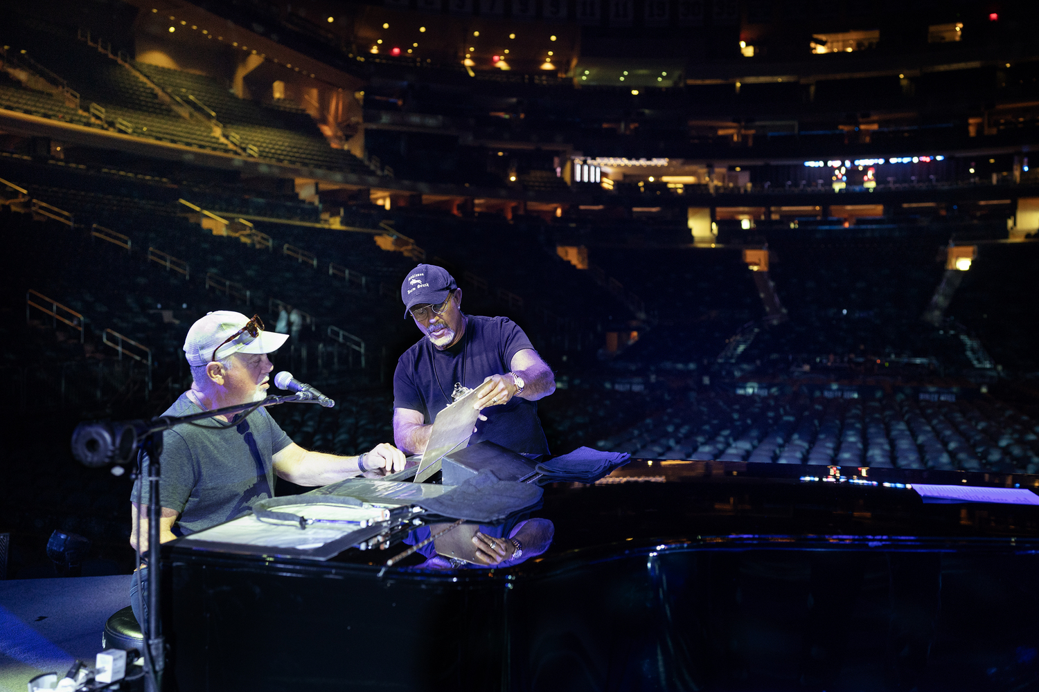 Billy Joel and Steve Cohen going over the set list at Madison Square Gardens. MYRNA SUAREZ