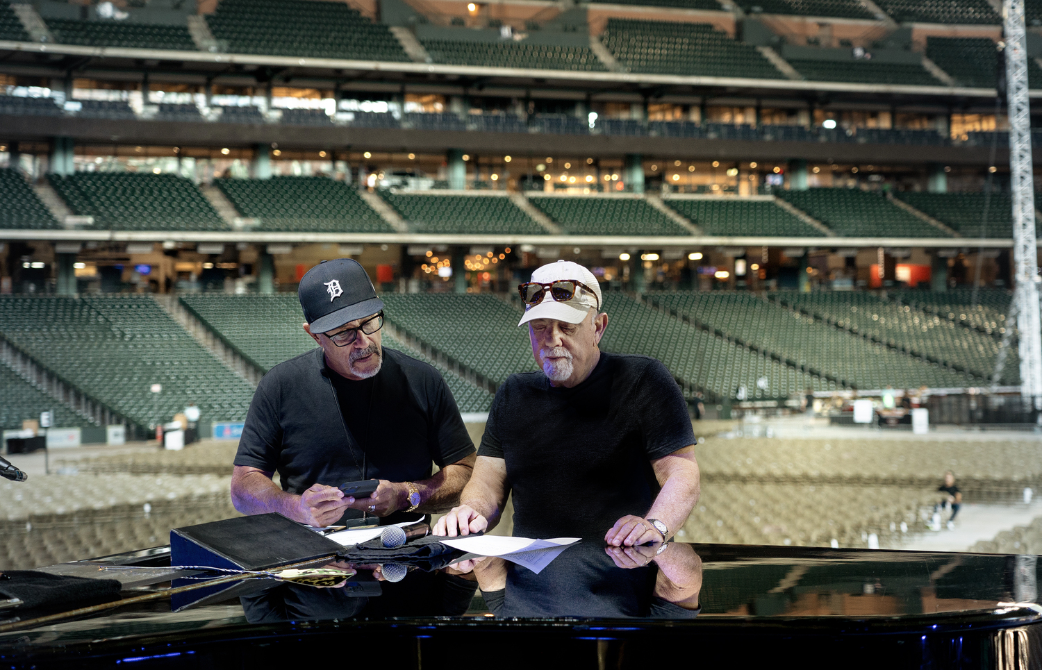Steve Cohen and Billy Joel going over the set list at Madison Square Gardens. MYRNA SUAREZ