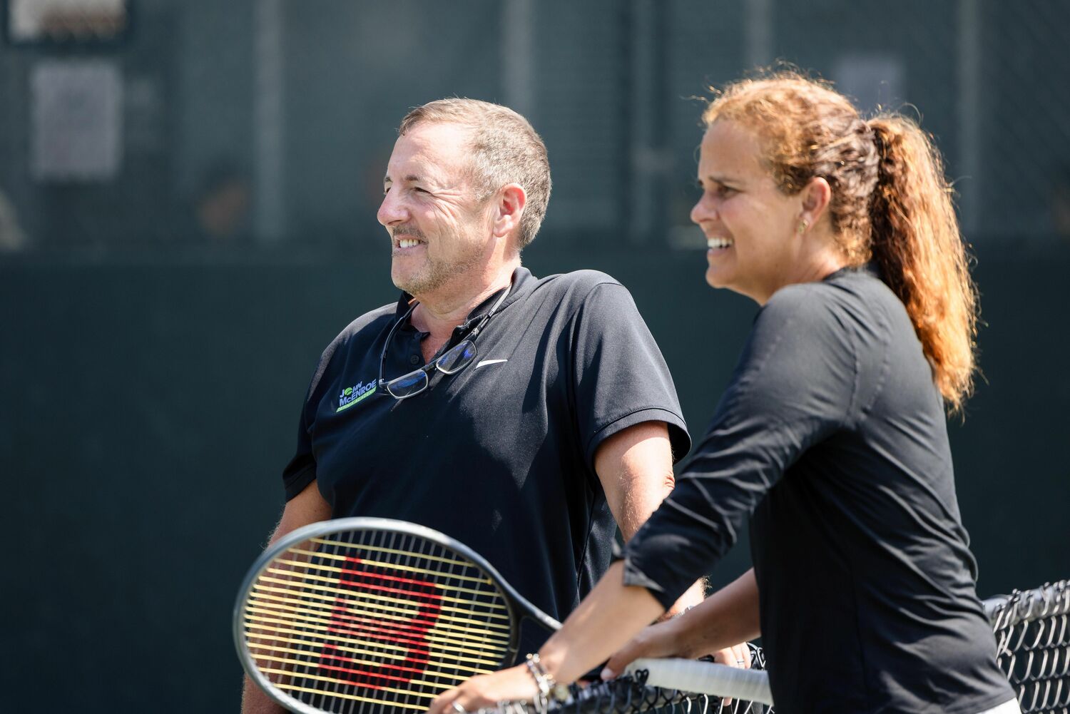 Sportime CEO Claude Okin with Mary Joe Fernández.  COURTESY HERITAGEHOUSEPHOTO.COM