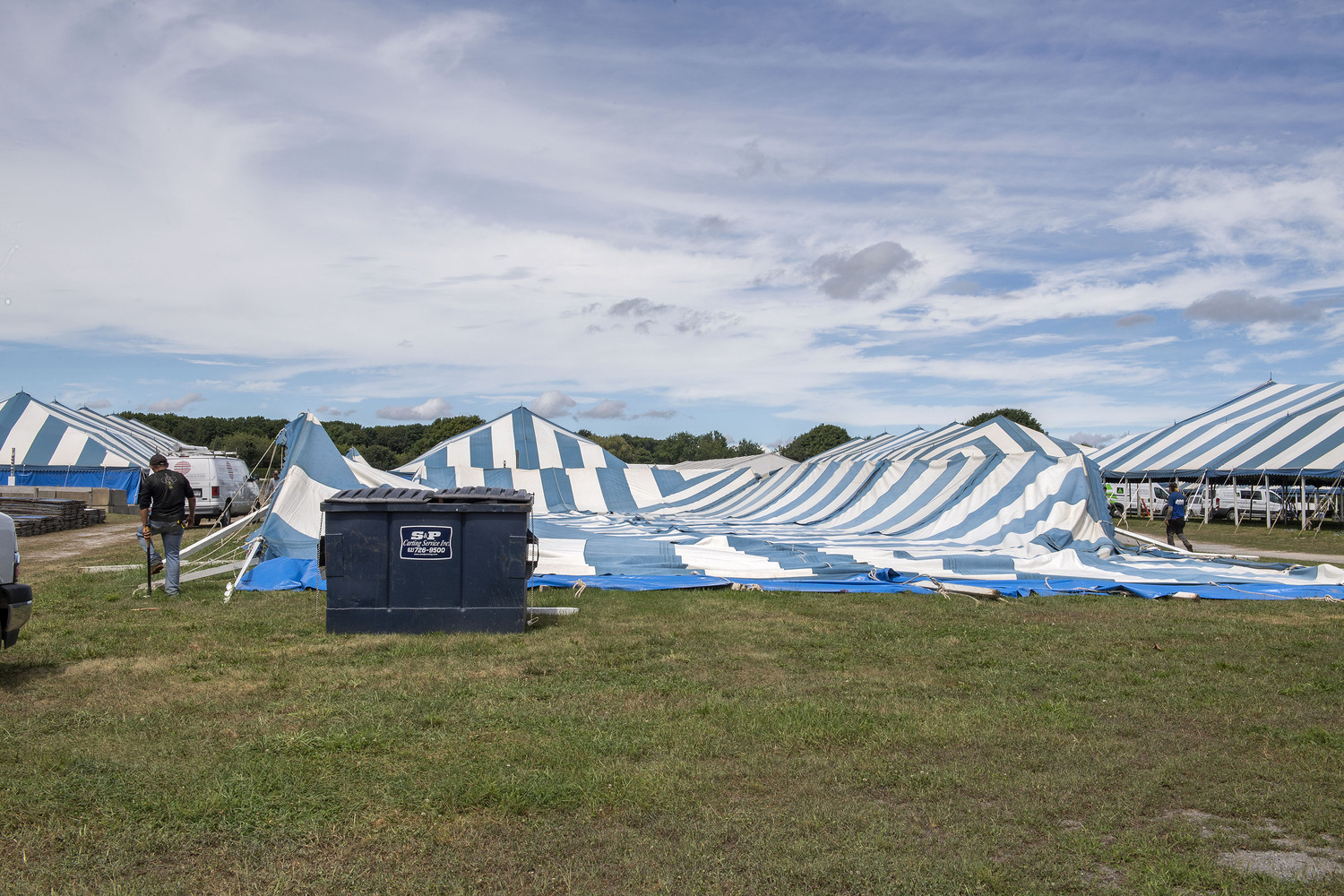With the approach of Hurricane Henri, ground crews at the Hampton classic take down the large stable-tents on Friday, August 20th, 2021.   FILE PHOTO