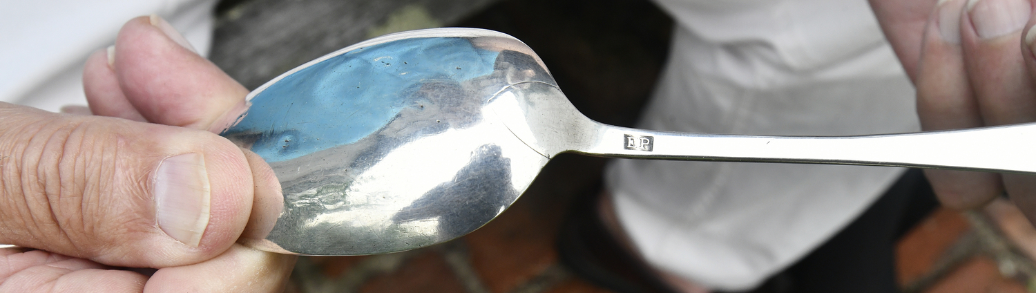The EP hallmark can be clearly seen on the larger of the spoons.  DANA SHAW