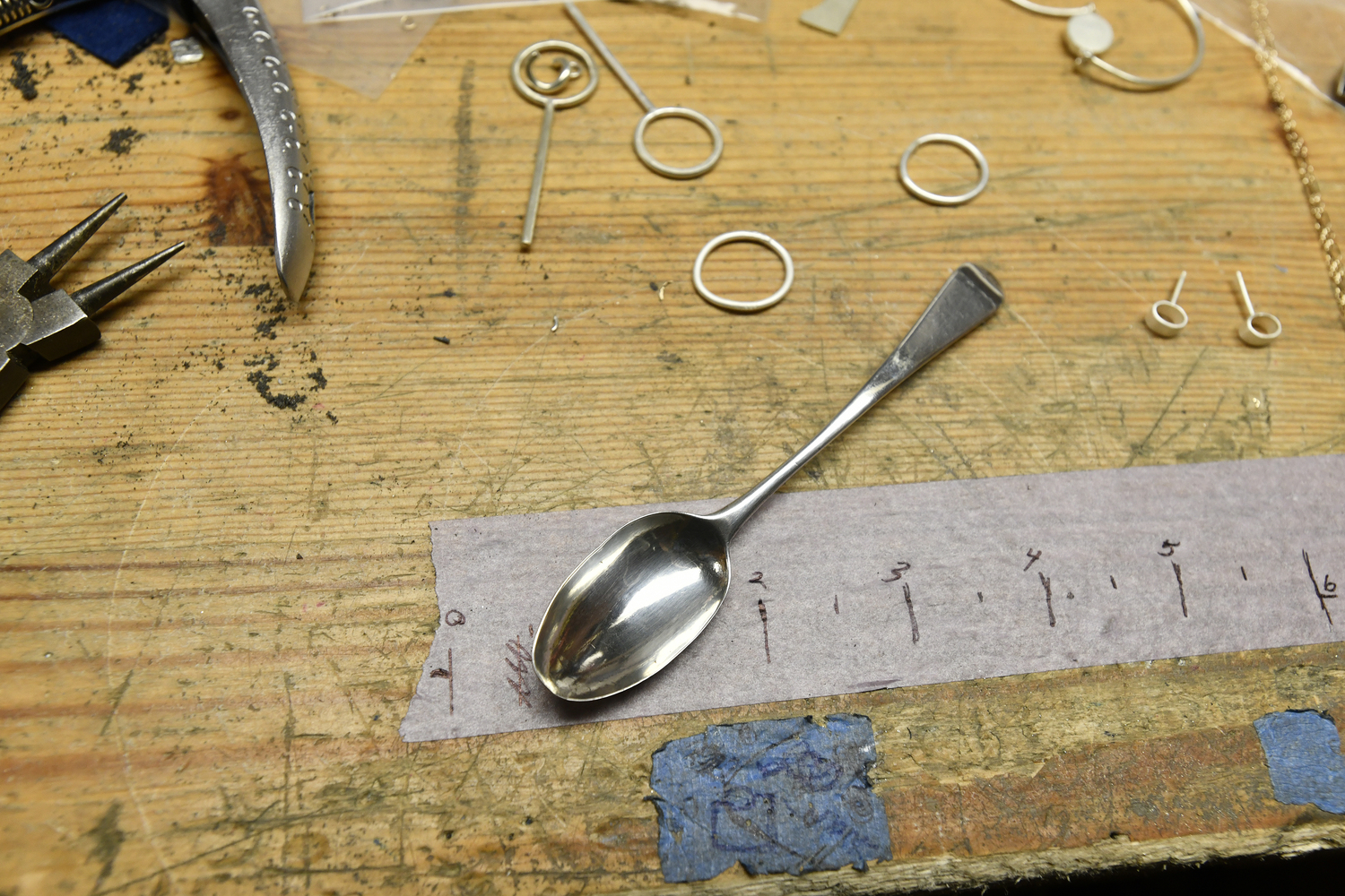 The smaller spoon, which was likely used for salt or condiments. The spoon had been chewed on by a previous owner’s dog, leaving small teeth marks on the bowl.     DANA SHAW