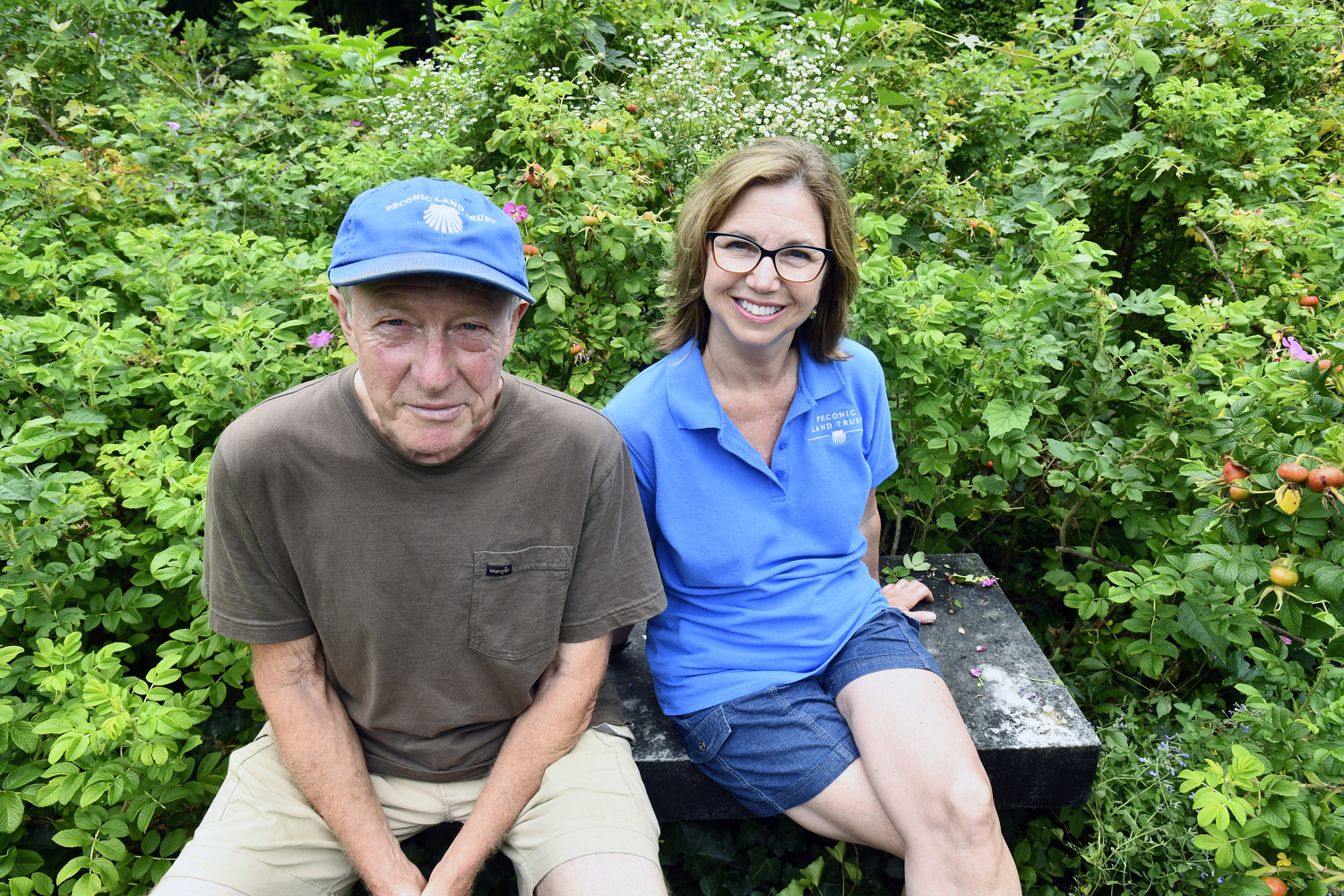 Rick Bogusch and Kathy Kennedy in the herb garden at Bridge Gardens.  DANA SHAW